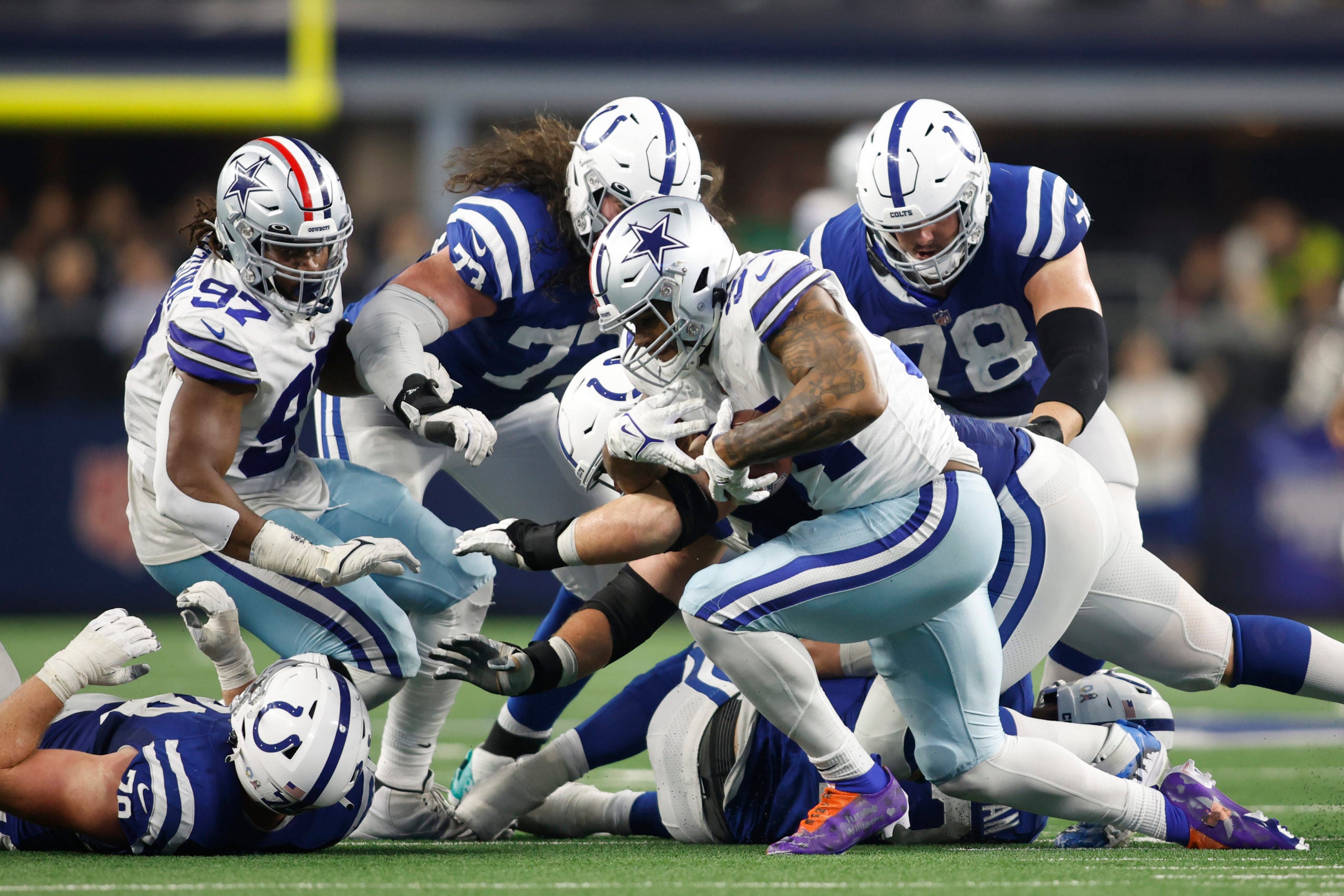 Dec 4, 2022; Arlington, Texas, USA; Dallas Cowboys defensive end Sam Williams (54) recovers a  fumble against the Indianapolis Colts in the fourth quarter at AT&T Stadium. Mandatory Credit: Tim Heitman-USA TODAY Sports