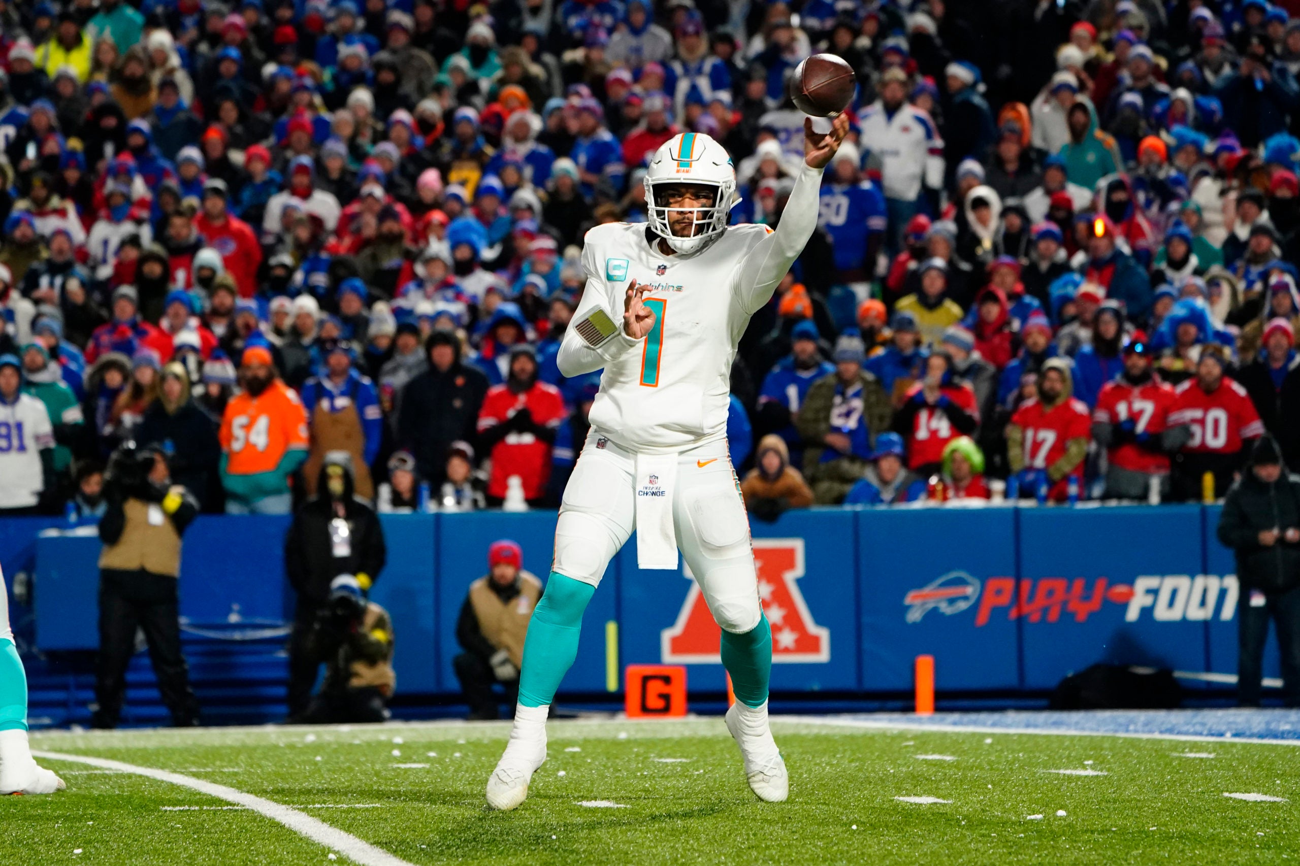 Dec 17, 2022; Orchard Park, New York, USA; Miami Dolphins quarterback Tua Tagovailoa (1) throws the ball against the Buffalo Bills during the second half at Highmark Stadium. Mandatory Credit: Gregory Fisher-USA TODAY Sports