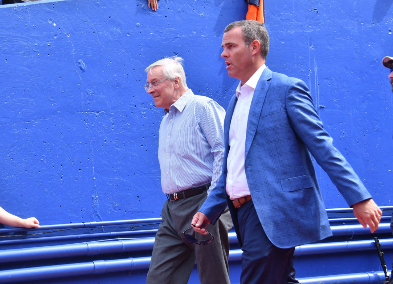 Aug 20, 2022; Orchard Park, New York, USA; Buffalo Bills owner Terry Pagula (left) and general manager Brandon Beane enter the field before a pre-season game against the Denver Broncos at Highmark Stadium. Mandatory Credit: Mark Konezny-USA TODAY Sports
