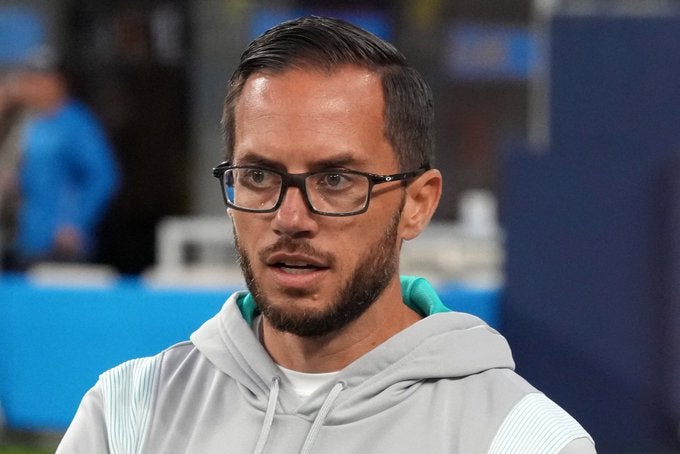 Miami Dolphins head coach HC Mike McDaniel wears shirt weather snow cold wind Buffalo Bills nfl football stats news