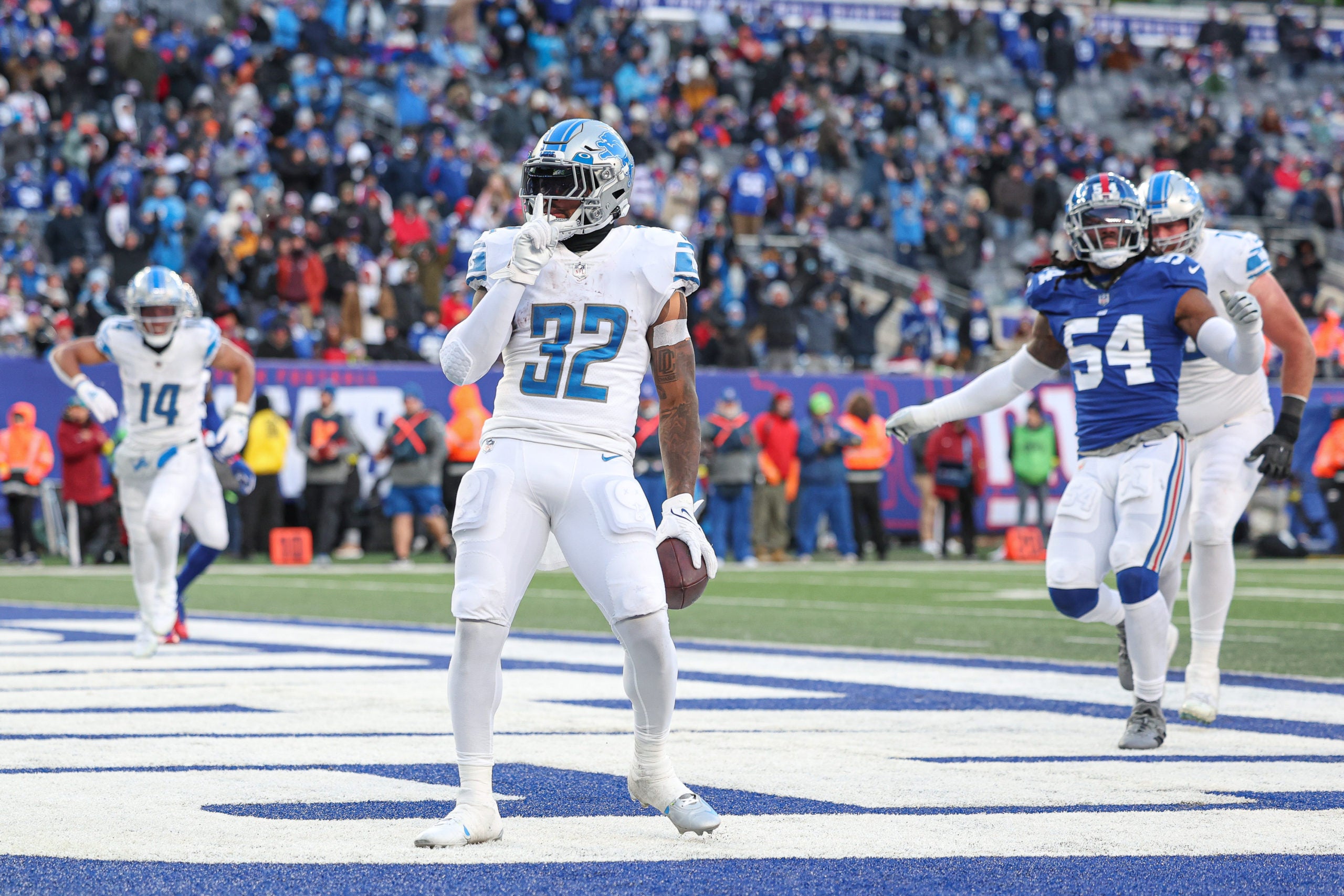 Nov 20, 2022; East Rutherford, New Jersey, USA; Detroit Lions running back D'Andre Swift (32) reacts after scoring a rushing touchdown during the second half against the New York Giants at MetLife Stadium. Mandatory Credit: Vincent Carchietta-USA TODAY Sports
