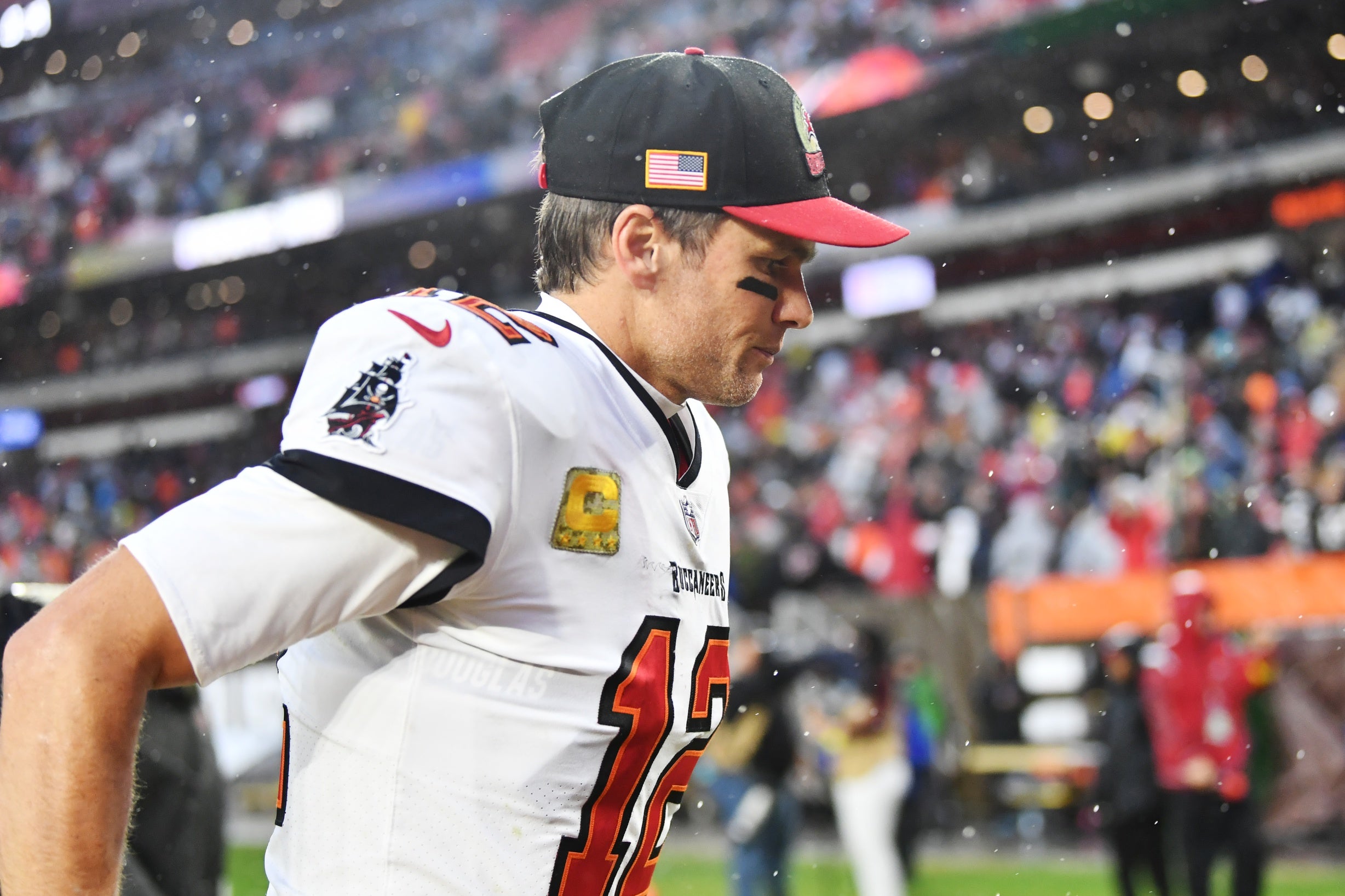 Nov 27, 2022; Cleveland, Ohio, USA; Tampa Bay Buccaneers quarterback Tom Brady (12) runs off the field after the Buccaneers lost to the Cleveland Browns at FirstEnergy Stadium. Mandatory Credit: Ken Blaze-USA TODAY Sports