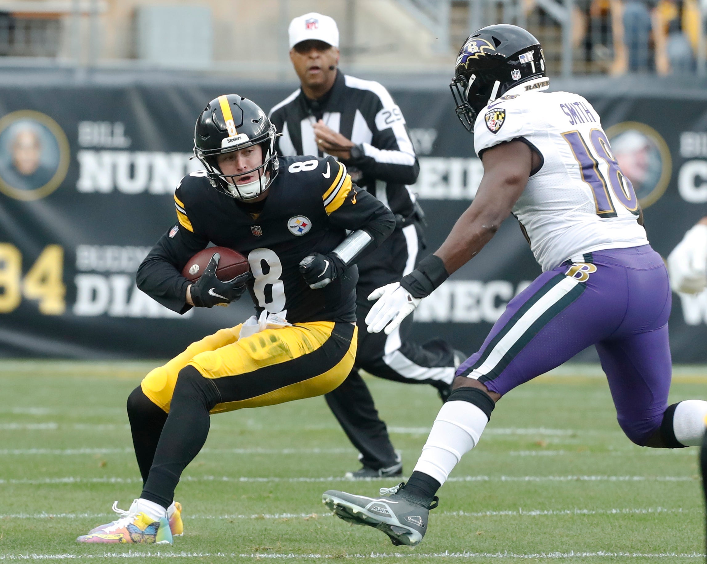 Dec 11, 2022; Pittsburgh, Pennsylvania, USA;  Pittsburgh Steelers quarterback Kenny Pickett (8) is sacked by  Baltimore Ravens linebacker Roquan Smith (18) during the first quarter at Acrisure Stadium. Mandatory Credit: Charles LeClaire-USA TODAY Sports