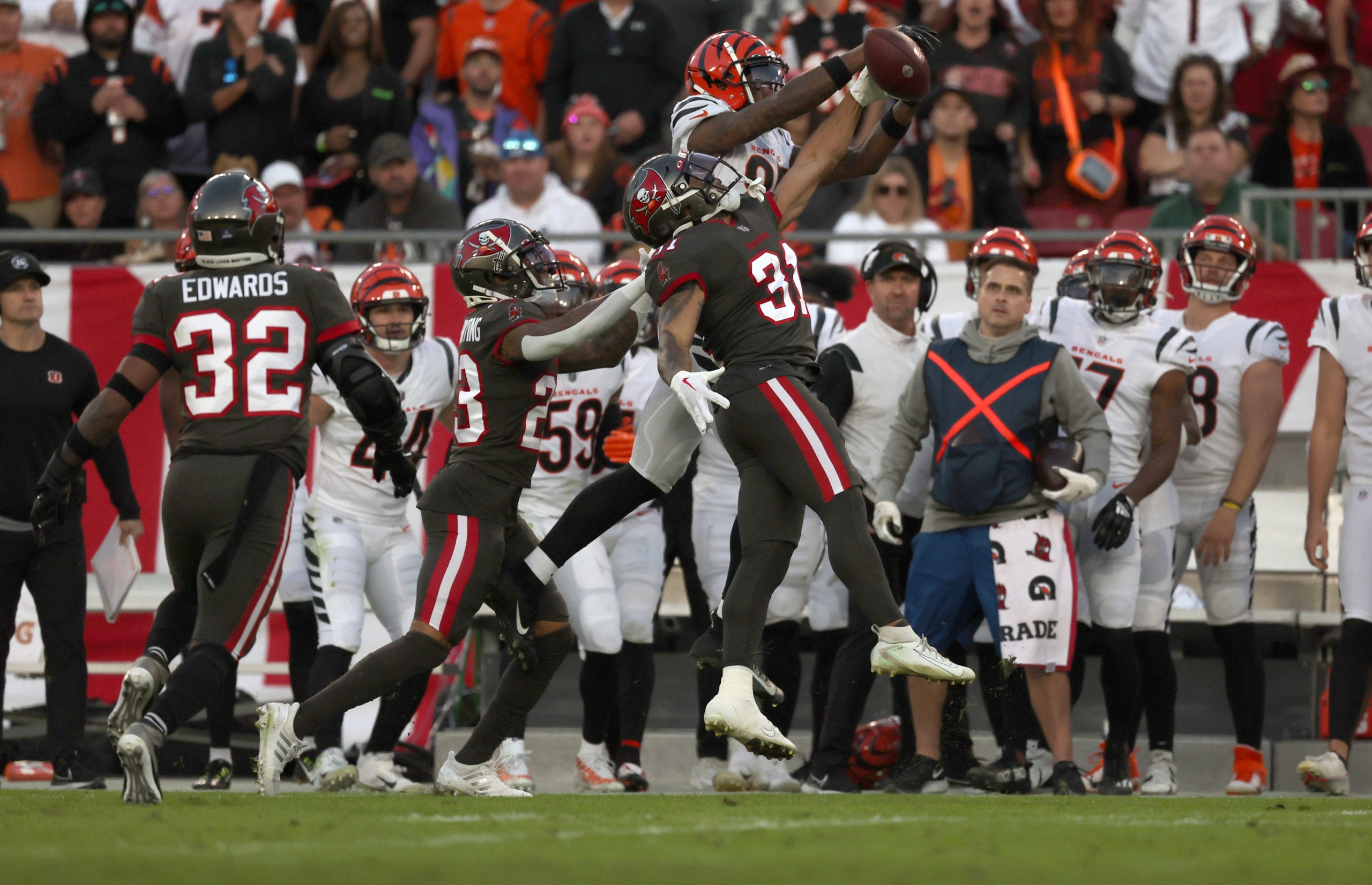 Dec 18, 2022; Tampa, Florida, USA;Tampa Bay Buccaneers safety Antoine Winfield Jr. (31) breaks up  Cincinnati Bengals wide receiver Tee Higgins (85) pass during the second quarter at Raymond James Stadium. Mandatory Credit: Kim Klement-USA TODAY Sports