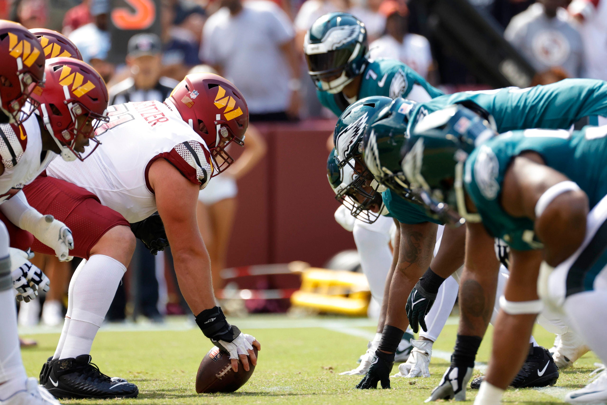 Sep 25, 2022; Landover, Maryland, USA; The Washington Commanders offense lines up against the Philadelphia Eagles defense during the first quarter at FedExField. Mandatory Credit: Geoff Burke-USA TODAY Sports