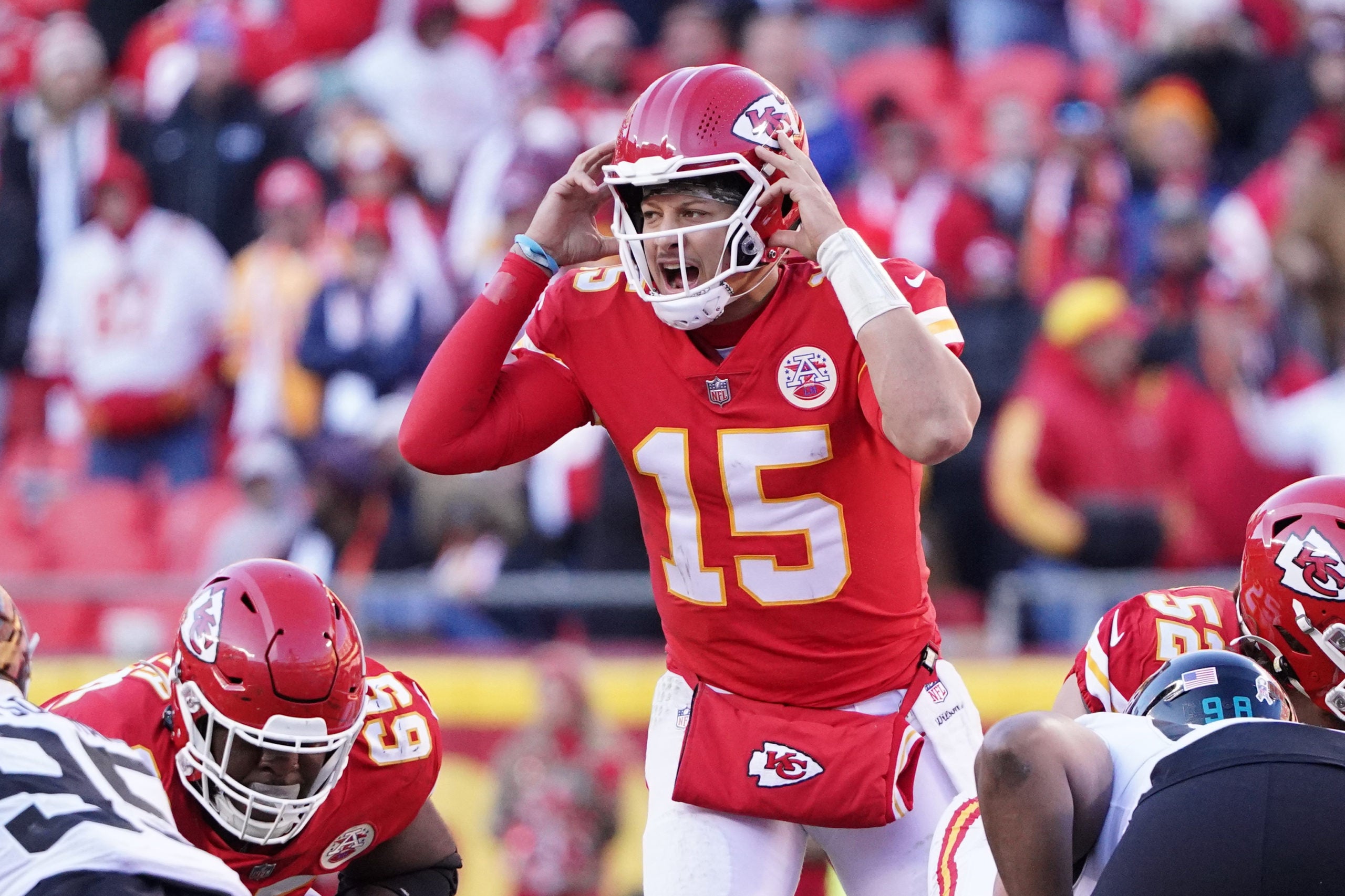 Nov 13, 2022; Kansas City, Missouri, USA; Kansas City Chiefs quarterback Patrick Mahomes (15) gestures on the line of scrimmage against the Jacksonville Jaguars during the second half of the game at GEHA Field at Arrowhead Stadium. Mandatory Credit: Denny Medley-USA TODAY Sports