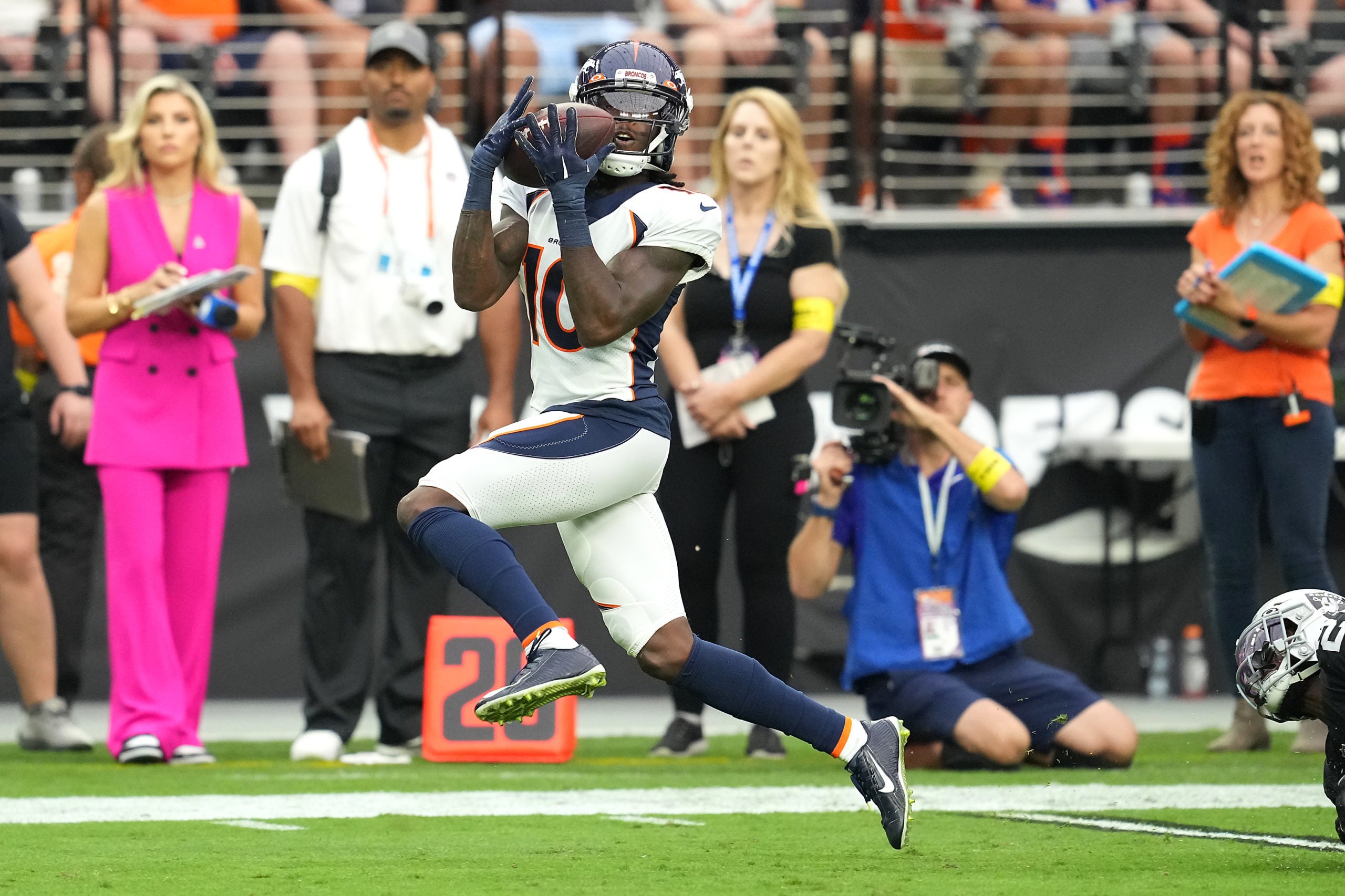 Oct 2, 2022; Paradise, Nevada, USA; Denver Broncos wide receiver Jerry Jeudy (10) makes a catch against the Las Vegas Raiders during a game at Allegiant Stadium. Mandatory Credit: Stephen R. Sylvanie-USA TODAY Sports