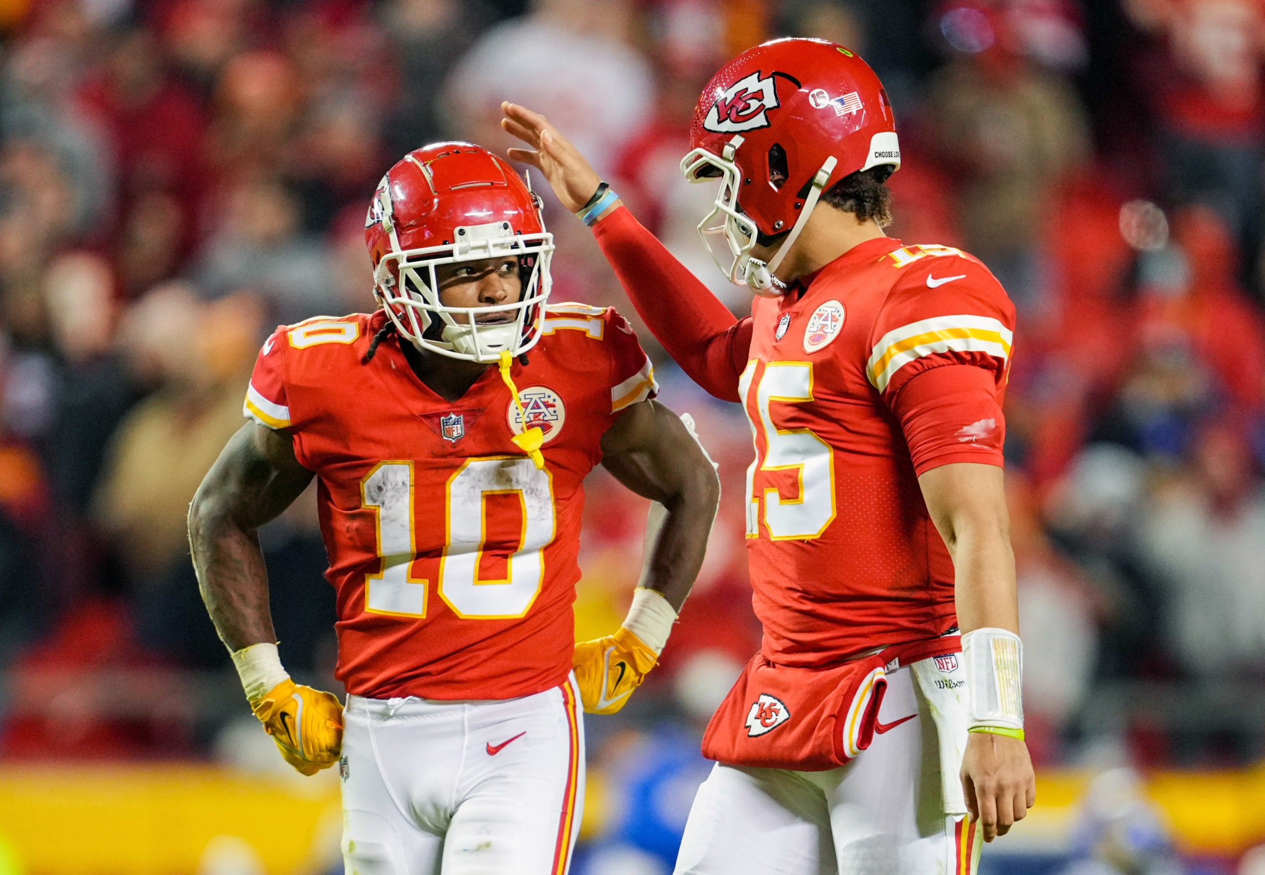 Nov 27, 2022; Kansas City, Missouri, USA; Kansas City Chiefs running back Isiah Pacheco (10) is congratulated by quarterback Patrick Mahomes (15) during the second half against the Los Angeles Rams at GEHA Field at Arrowhead Stadium. Mandatory Credit: Jay Biggerstaff-USA TODAY Sports