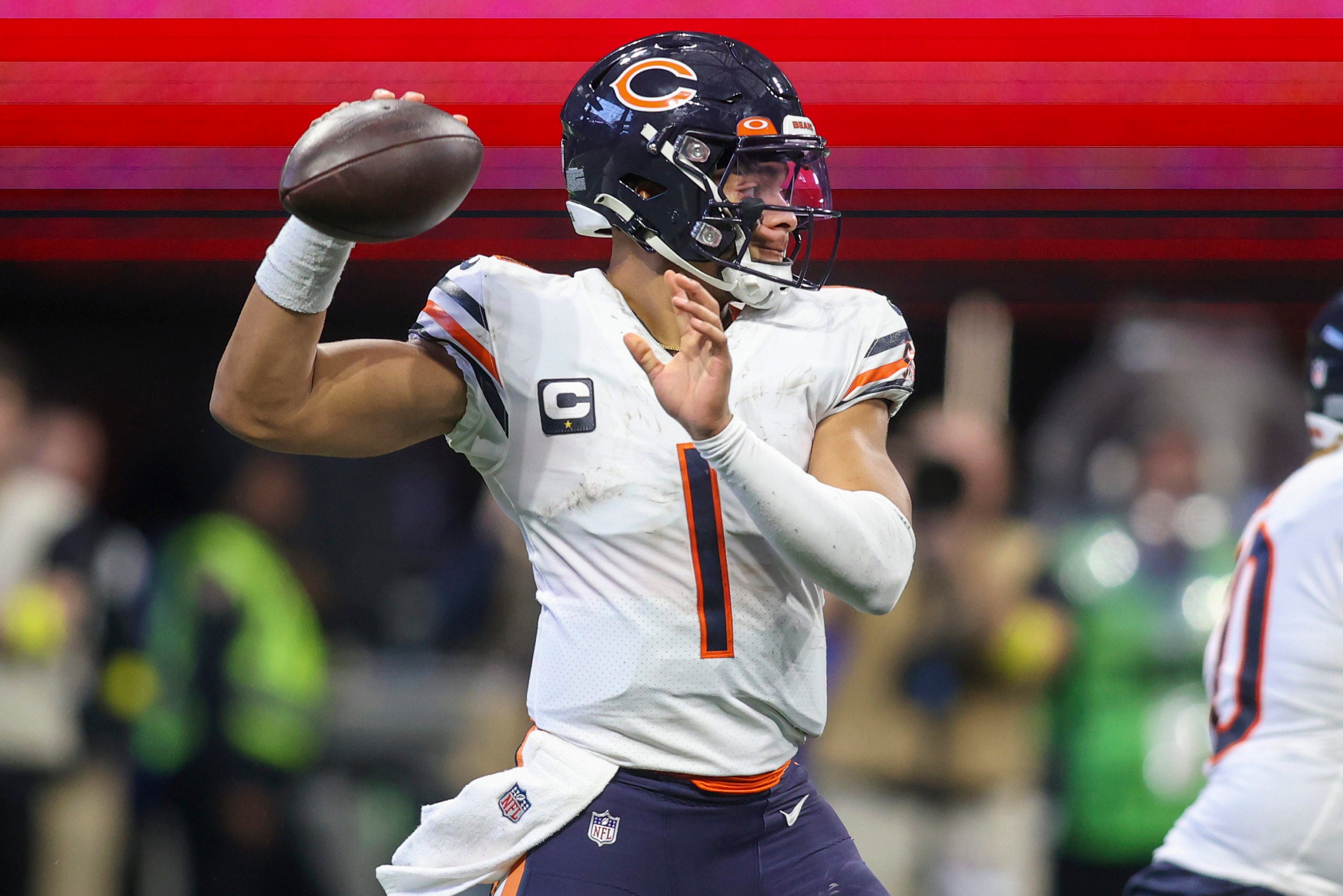 Nov 20, 2022; Atlanta, Georgia, USA; Chicago Bears quarterback Justin Fields (1) throws a pass against the Atlanta Falcons in the second half at Mercedes-Benz Stadium. Mandatory Credit: Brett Davis-USA TODAY Sports