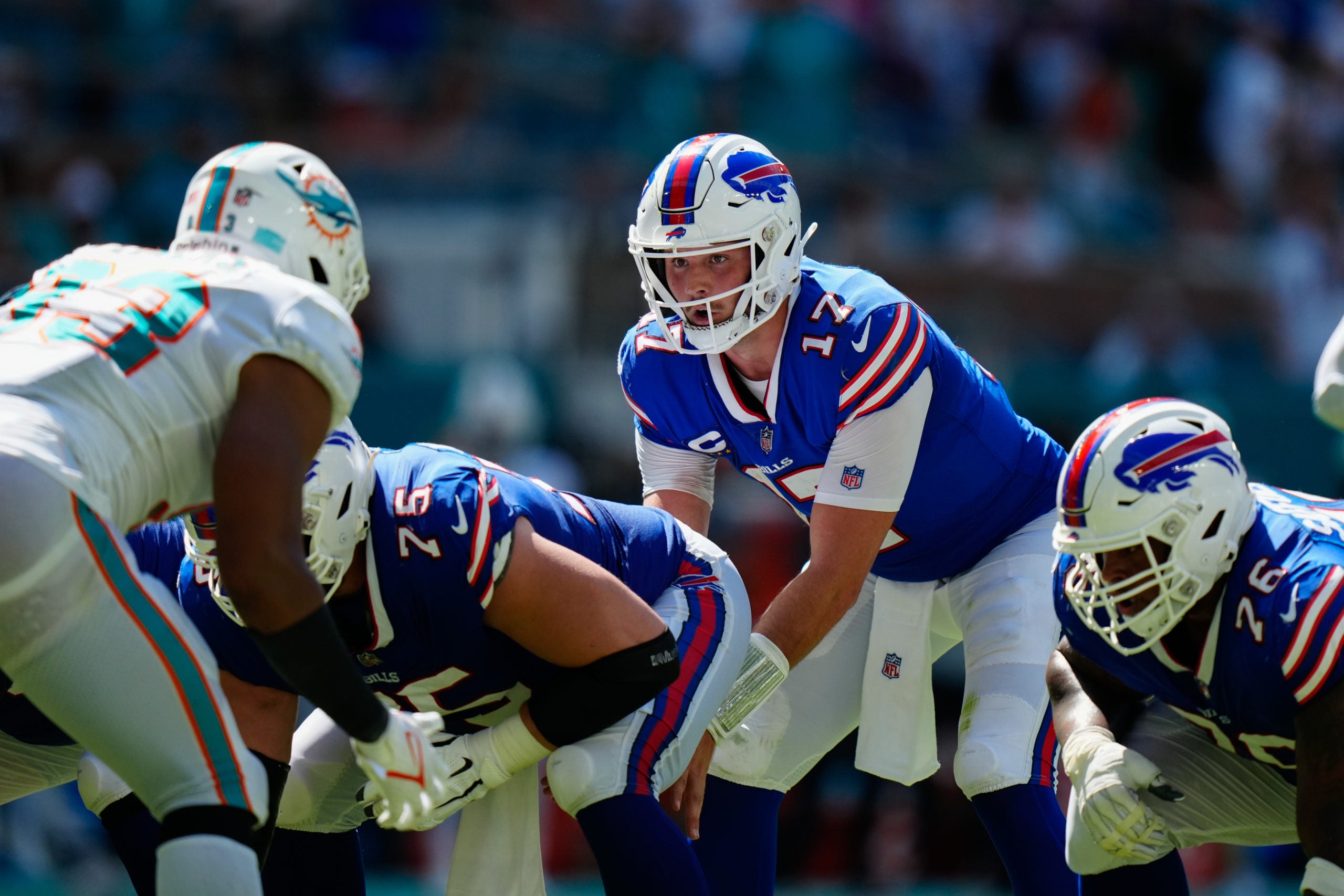 Sep 25, 2022; Miami Gardens, Florida, USA; Buffalo Bills quarterback Josh Allen (17) receives the snap against the Miami Dolphins during the second half at Hard Rock Stadium. Mandatory Credit: Rich Storry-USA TODAY Sports