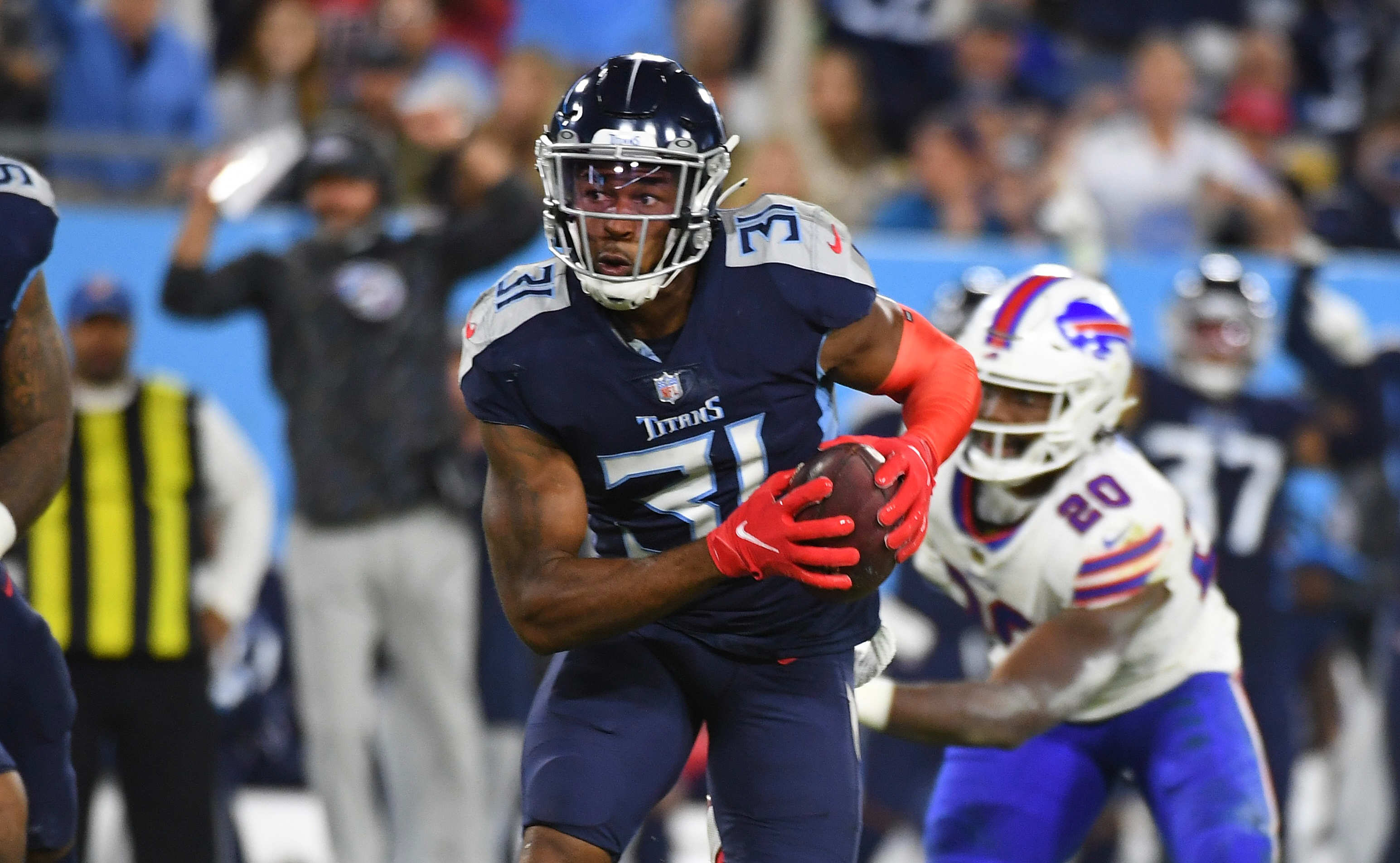 Oct 18, 2021; Nashville, Tennessee, USA; Tennessee Titans free safety Kevin Byard (31) runs after an interception during the first half against the Buffalo Bills at Nissan Stadium. Mandatory Credit: Christopher Hanewinckel-USA TODAY Sports