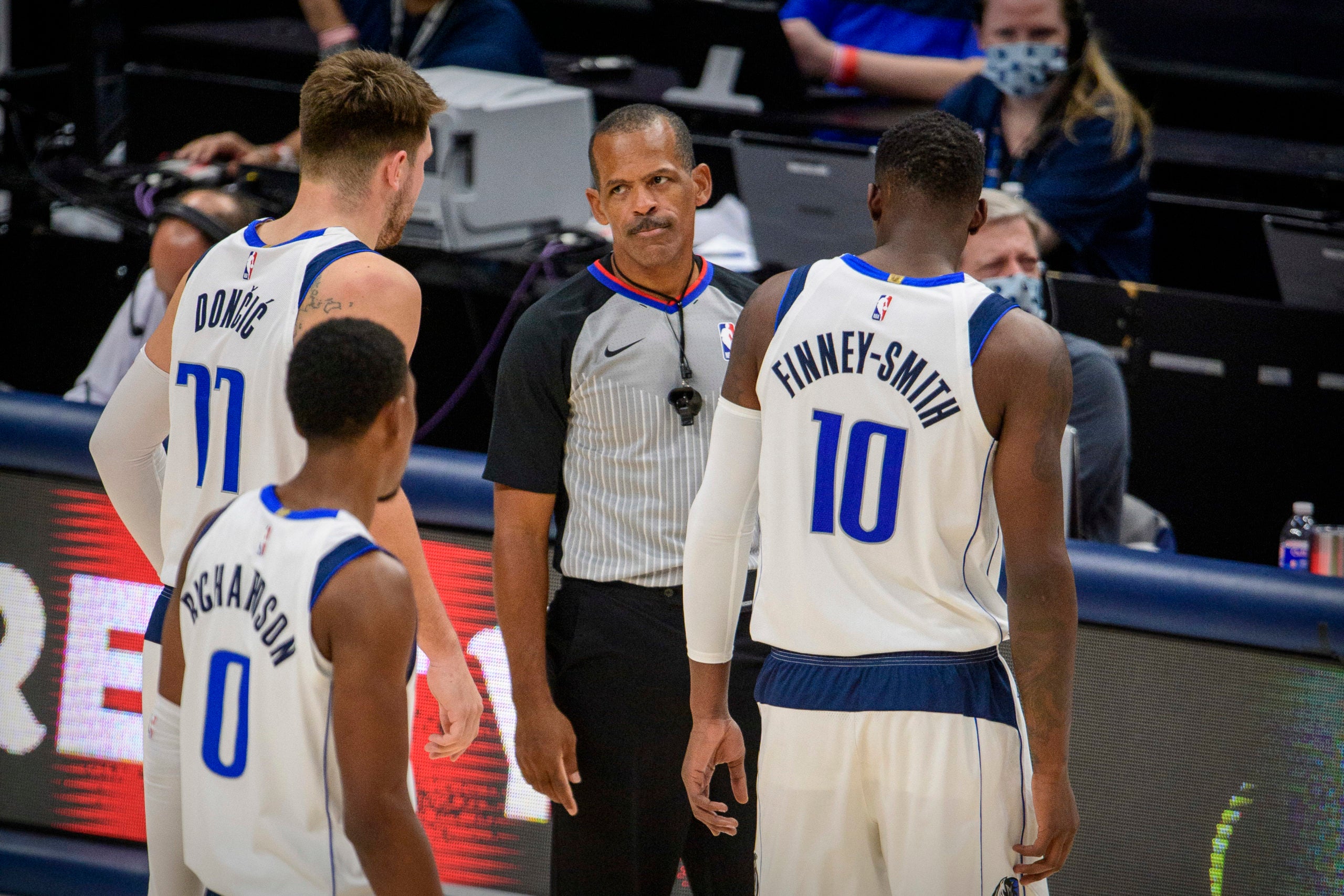 Dec 17, 2020; Dallas, Texas, USA; Dallas Mavericks guard Luka Doncic (77) exchanges words with referee Eric Lewis (42) after Doncic receives a technical foul during the second half against the Minnesota Timberwolves at the American Airlines Center. Mandatory Credit: Jerome Miron-USA TODAY Sports