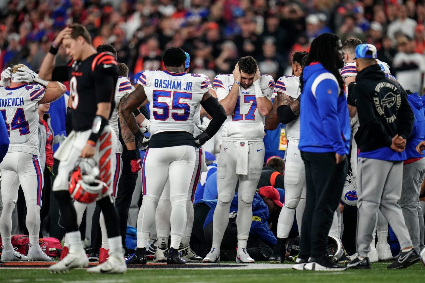 Josh Allen and the Buffalo Bills gather while CPR is administered to safety Damar Hamlin on Monday night. Syndication Democrat And Chronicle