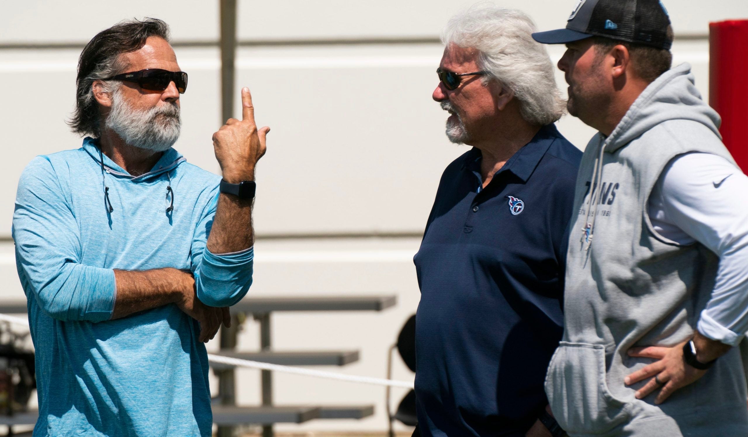 Former Tennessee Titans head coach Jeff Fisher talks with Dave McGinnis and Titans general manager Jon Robinson after a joint training camp practice against the Tampa Bay Buccaneers at Ascension Saint Thomas Sports Park Thursday, Aug. 18, 2022, in Nashville, Tenn. Nas 0818 Titans Bucs 028
