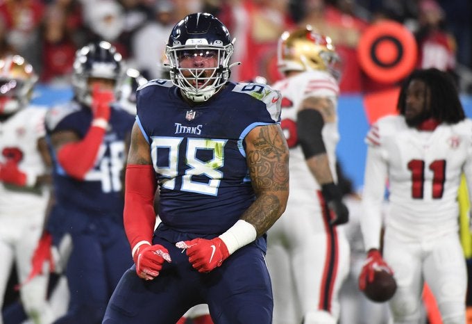 Tennessee Titans Los Angeles Rams DL Defensive linemen DT Jeffery Simmons Aaron Donald contract paid money extension