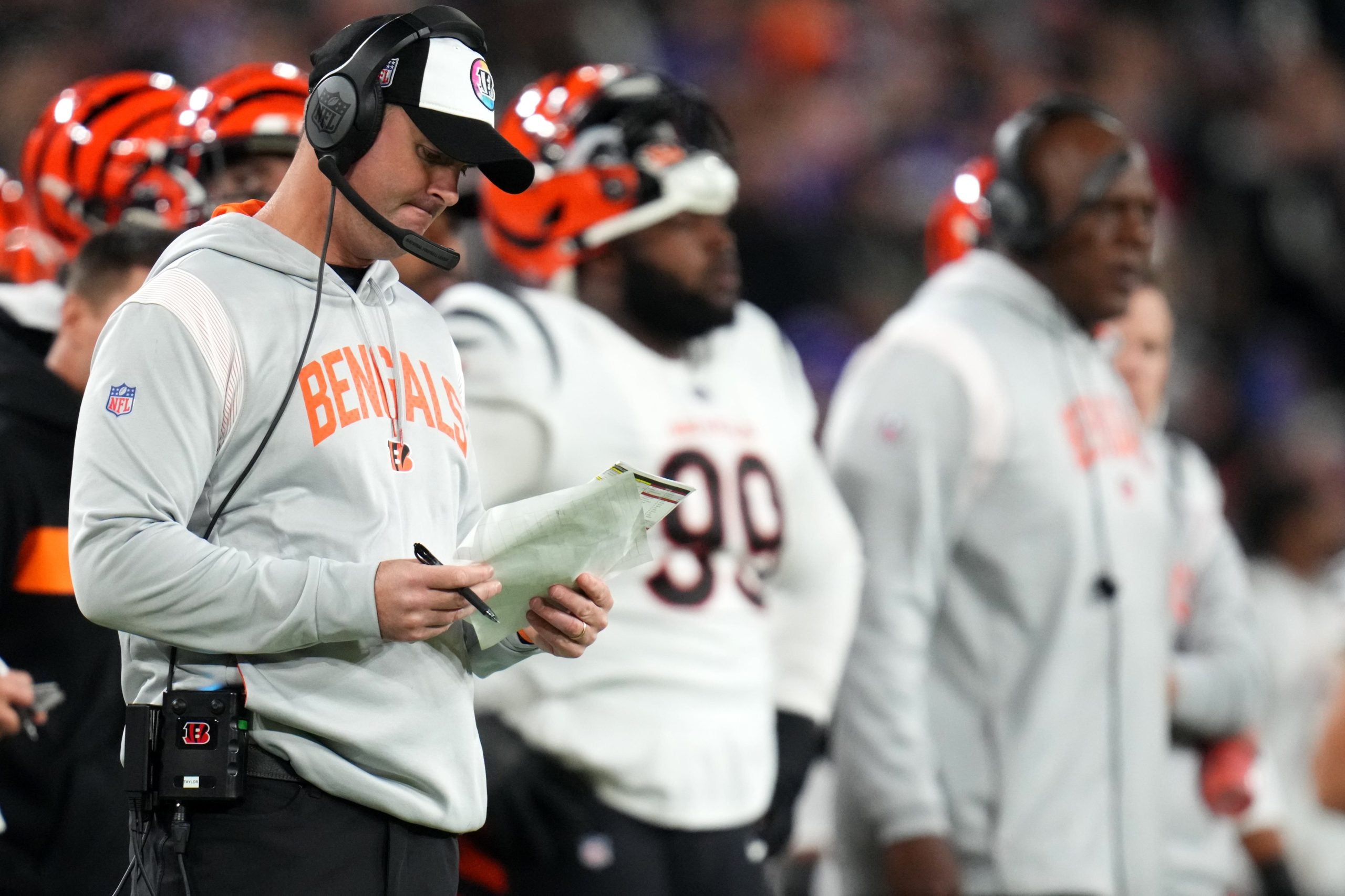 Cincinnati Bengals head coach Zac Taylor looks at his play sheet in the third quarter during an NFL Week 5 game against the Baltimore Ravens, Sunday, Oct. 9, 2022, at M&T Bank Stadium in Baltimore. Nfl Cincinnati Bengals At Baltimore Ravens Oct 9 0303