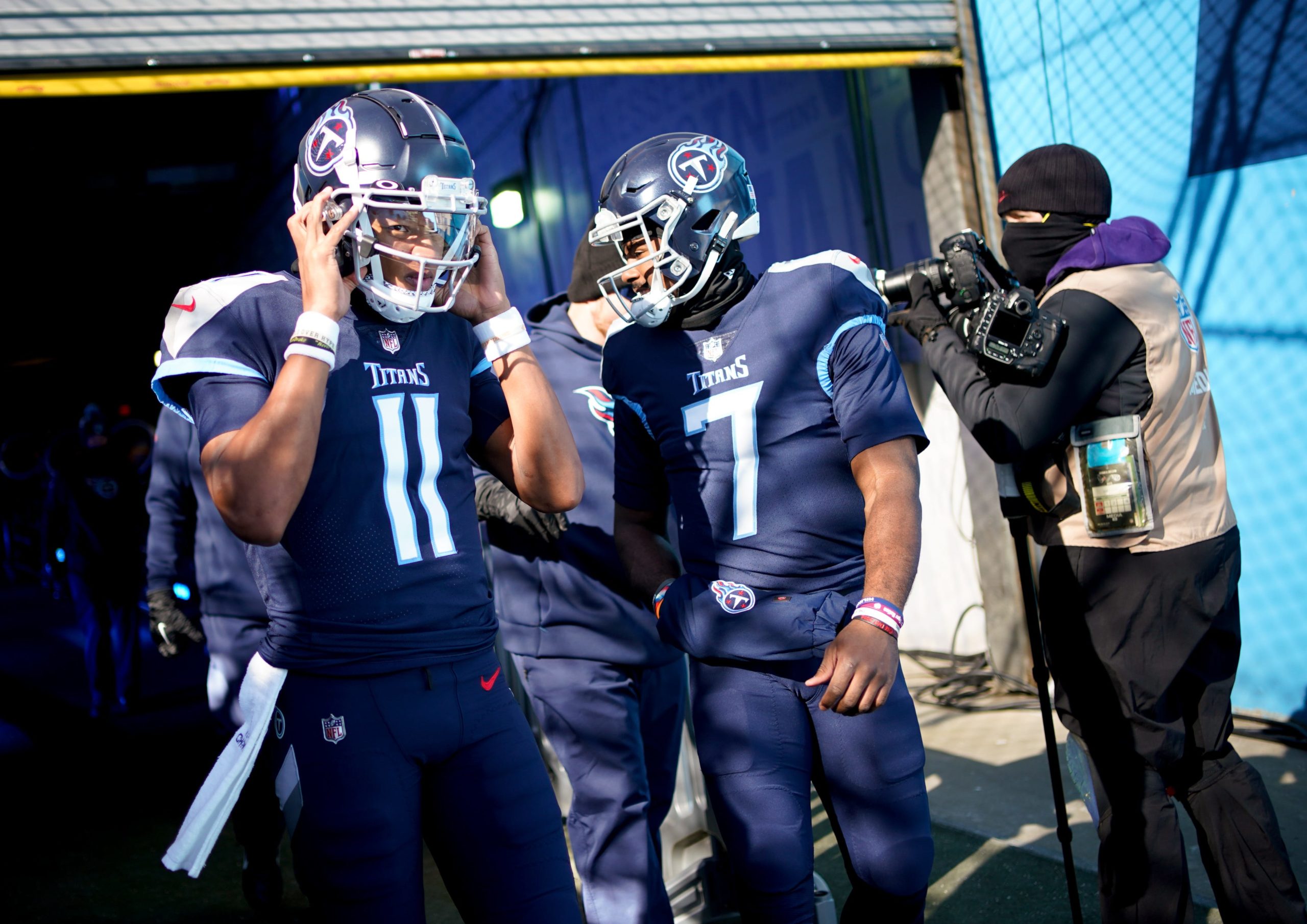 Tennessee Titans quarterbacks Joshua Dobbs (11) and Malik Willis (7) head to the field before facing the Houston Texans at Nissan Stadium in Nashville, Tenn., Saturday, Dec. 24, 2022. Nfl Houston Texans At Tennessee Titans