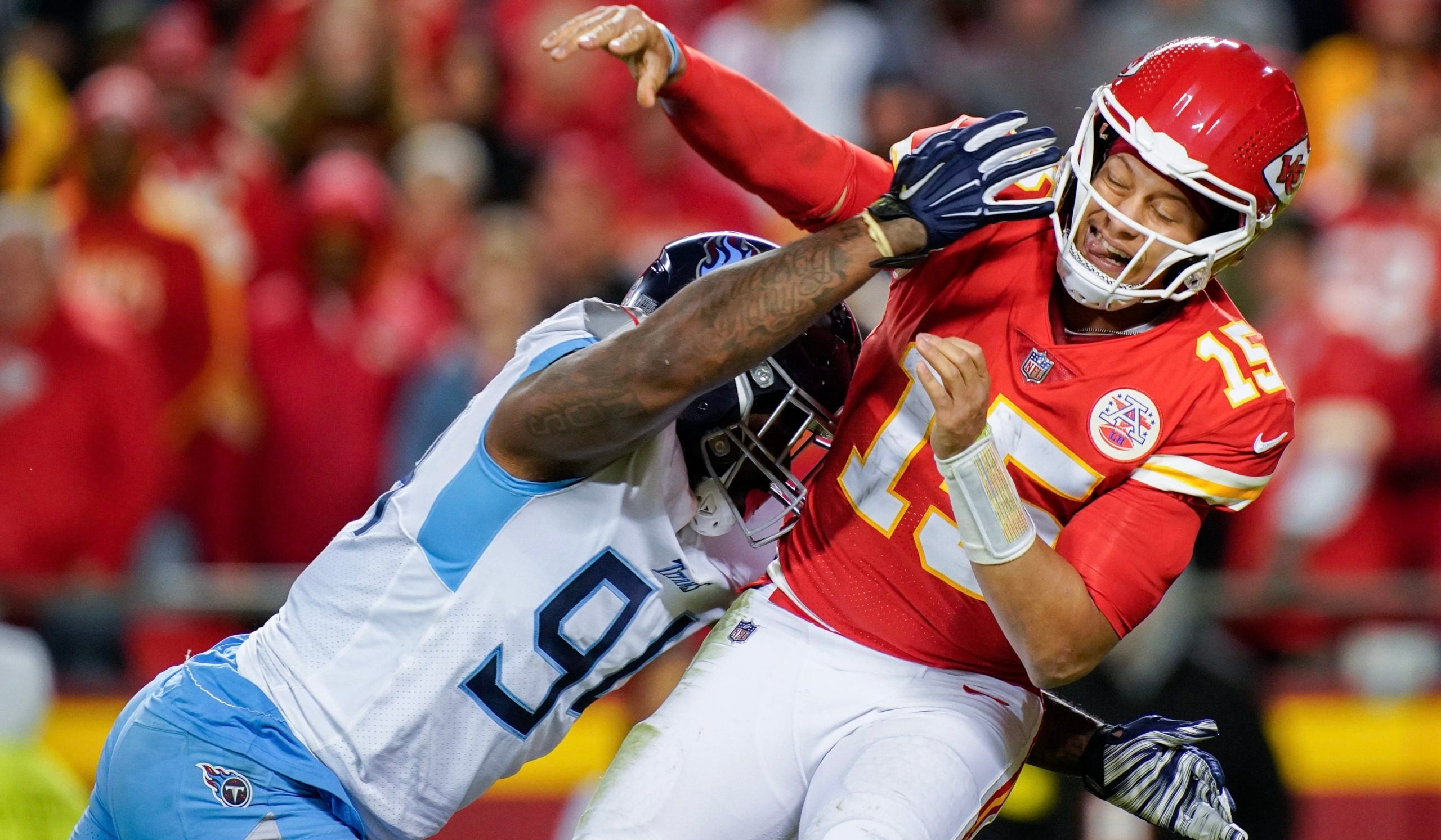 Tennessee Titans defensive end Mario Edwards Jr. (94) pressures Kansas City Chiefs quarterback Patrick Mahomes (15) during the fourth quarter at GEHA Field at Arrowhead Stadium Sunday, Nov. 6, 2022, in Kansas City, Mo. Nfl Tennessee Titans At Kansas City Chiefs