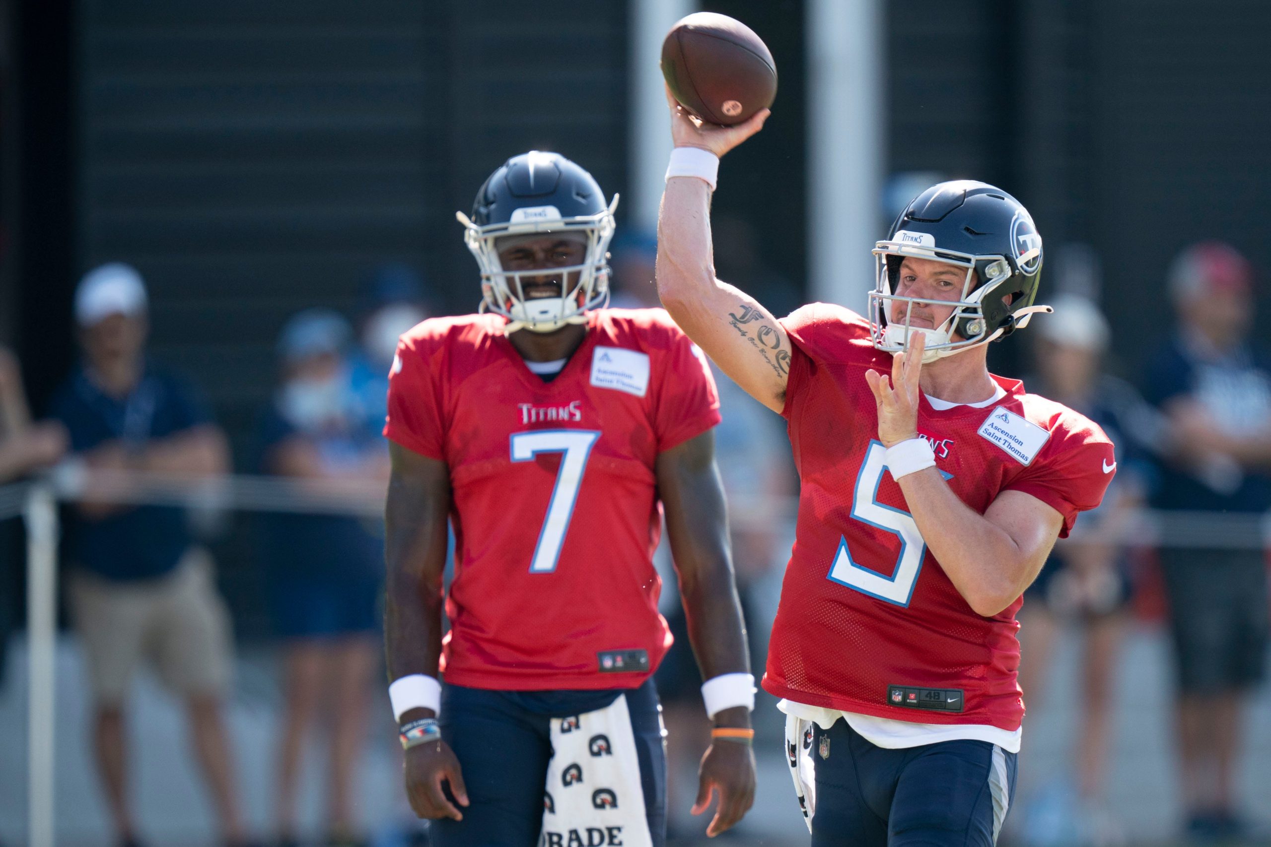 Tennessee Titans quarterback Logan Woodside (5) throws a pass during a training camp practice at Ascension Saint Thomas Sports Park Sunday, Aug. 7, 2022, in Nashville, Tenn. Nas 0807 Titans 006