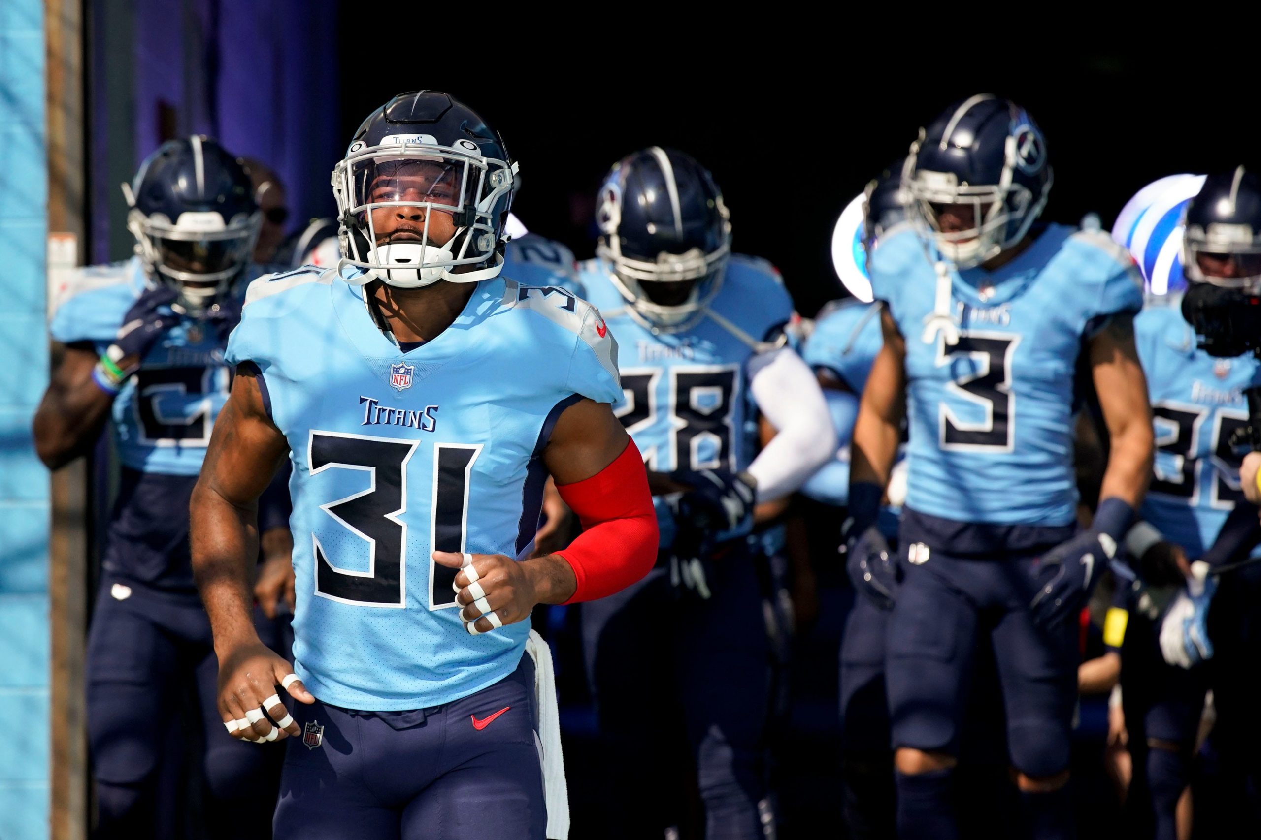 Tennessee Titans safety Kevin Byard (31) and other members of the team head to the field as the team gets ready to face the Indianapolis Colts at Nissan Stadium Sunday, Oct. 23, 2022, in Nashville, Tenn. Nfl Indianapolis Colts At Tennessee Titans
