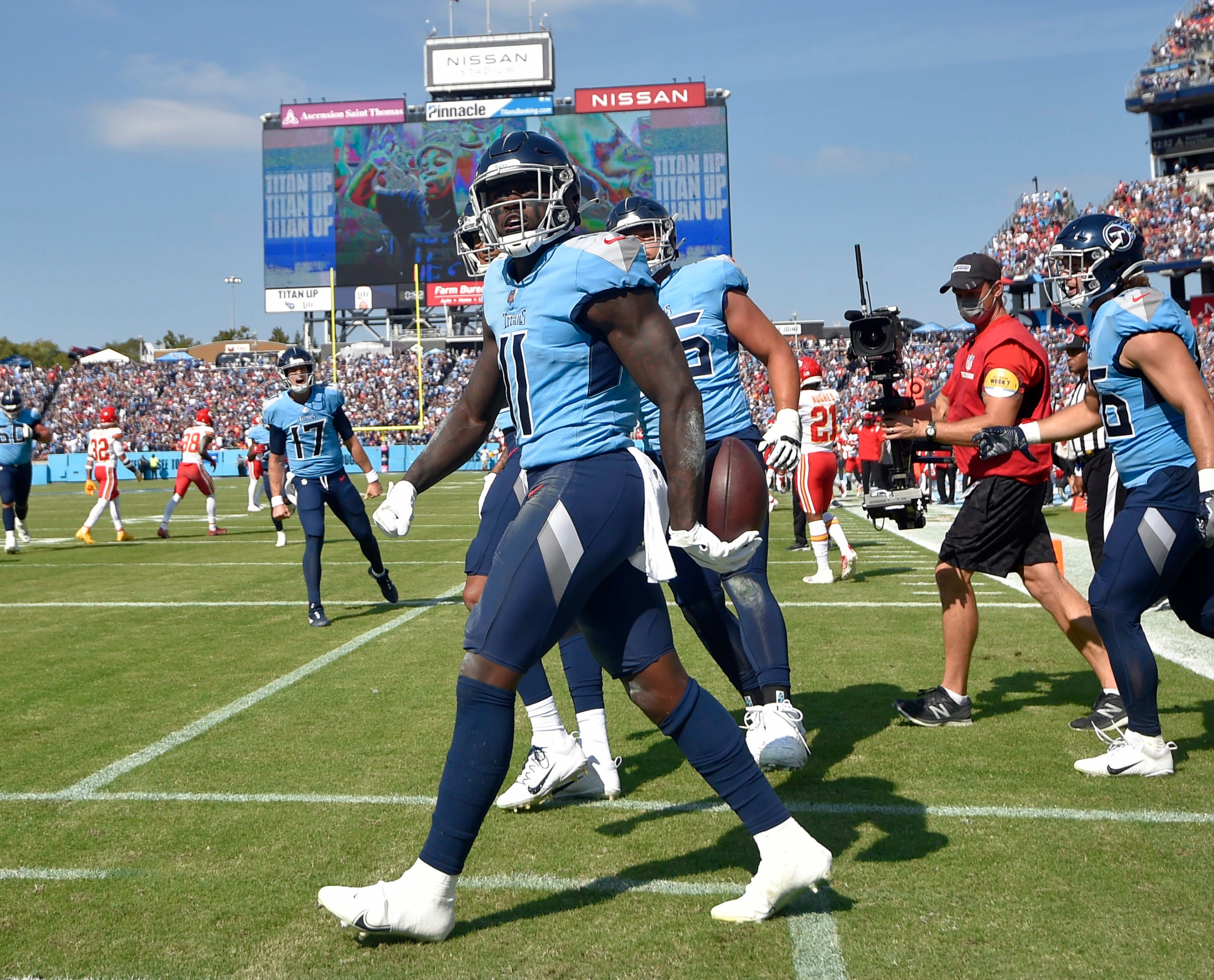 Oct 24, 2021; Nashville, Tennessee, USA;  Tennessee Titans wide receiver A.J. Brown (11) celebrates his touchdown against the Kansas City Chiefs during the first half at Nissan Stadium. Mandatory Credit: Steve Roberts-USA TODAY Sports