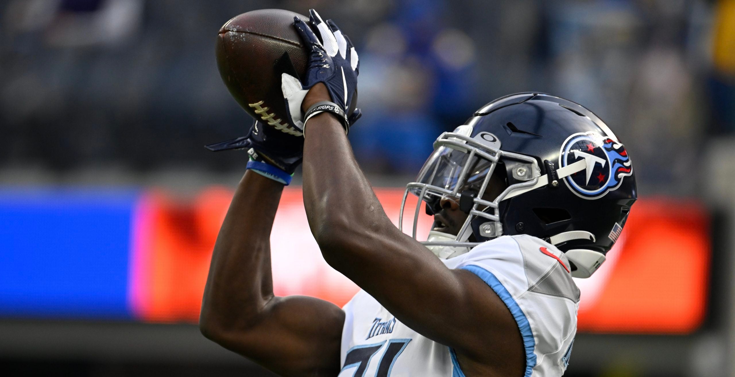 Dec 18, 2022; Inglewood, California, USA; Tennessee Titans cornerback Roger McCreary (21) catches a pass during pregame warmups before an NFL game against the Los Angeles Chargers at SoFi Stadium. Mandatory Credit: Robert Hanashiro-USA TODAY Sports