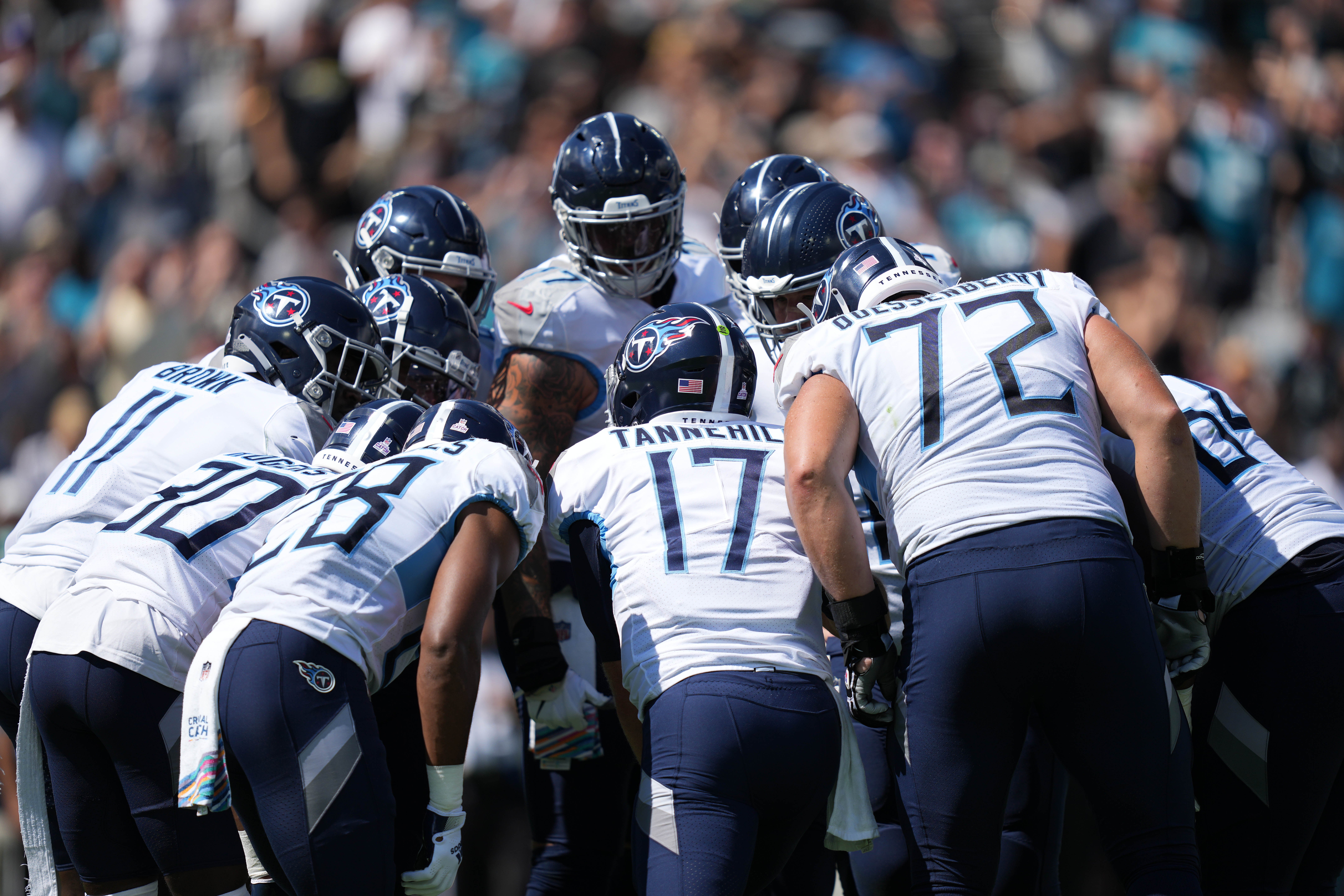 Oct 10, 2021; Jacksonville, Florida, USA; Tennessee Titans quarterback Ryan Tannehill (17) huddles with his offense during the first half against the Jacksonville Jaguars at TIAA Bank Field. Mandatory Credit: Jasen Vinlove-USA TODAY Sports