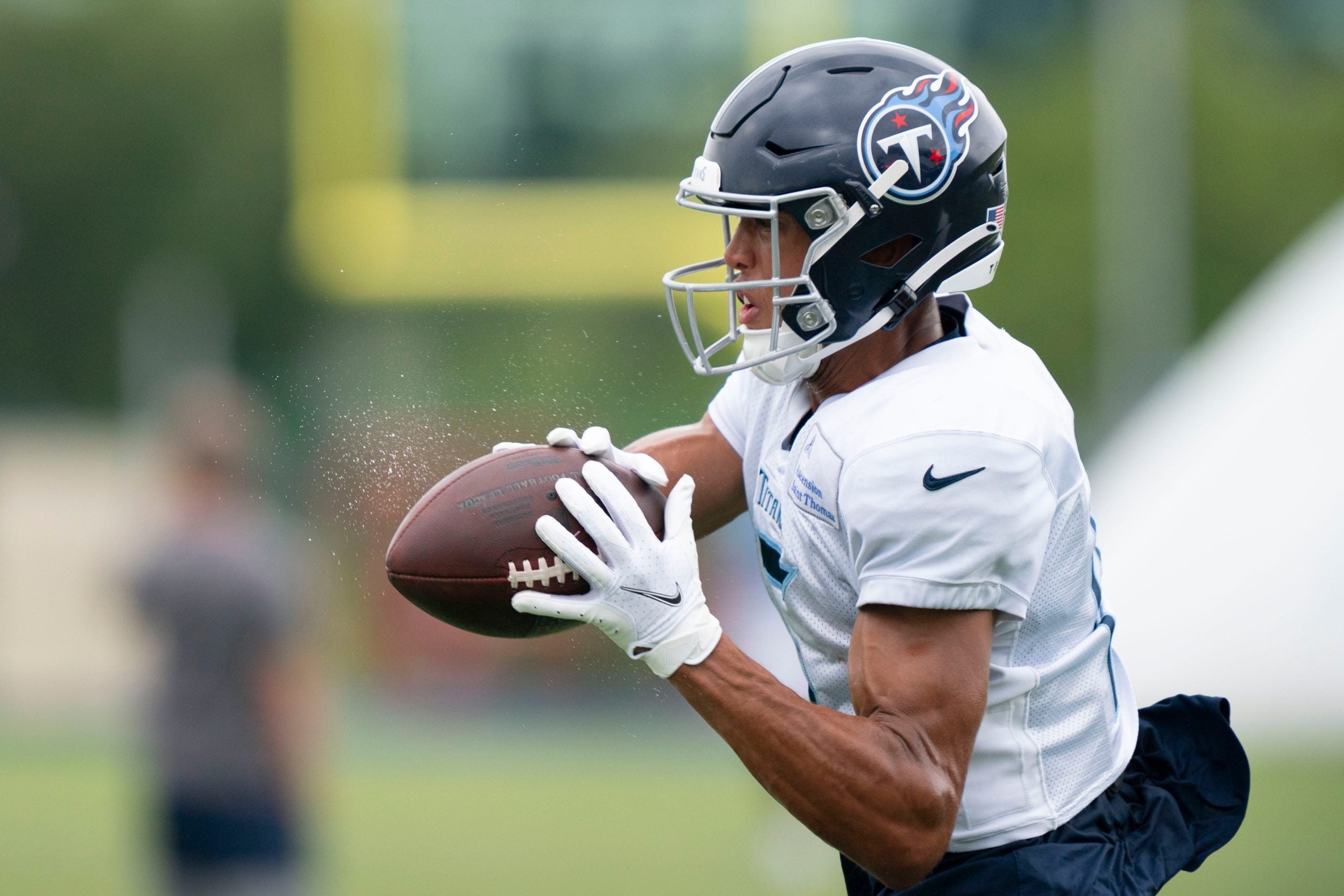Tennessee Titans wide receiver Nick Westbrook-Ikhine (15) pulls in a catch during a training camp practice at Ascension Saint Thomas Sports Park Friday, Aug. 5, 2022, in Nashville, Tenn. Nas 0805 Titans 013