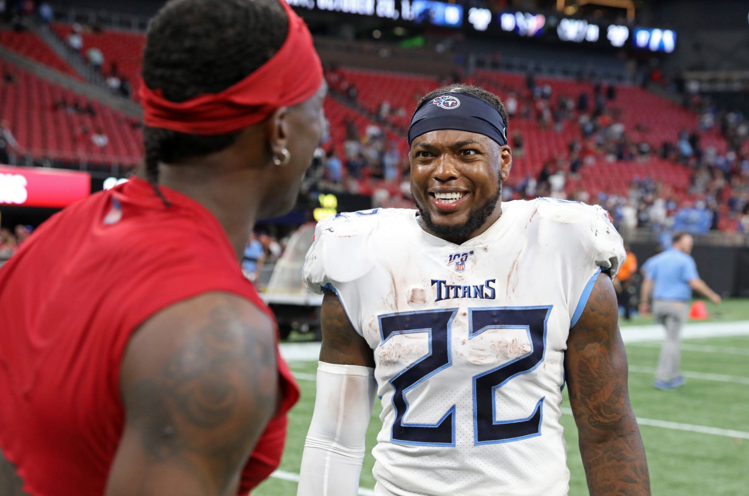 Sep 29, 2019; Atlanta, GA, USA; Atlanta Falcons wide receiver Julio Jones (11) talks with Tennessee Titans running back Derrick Henry (22) after their game at Mercedes-Benz Stadium. Mandatory Credit: Jason Getz-USA TODAY Sports
