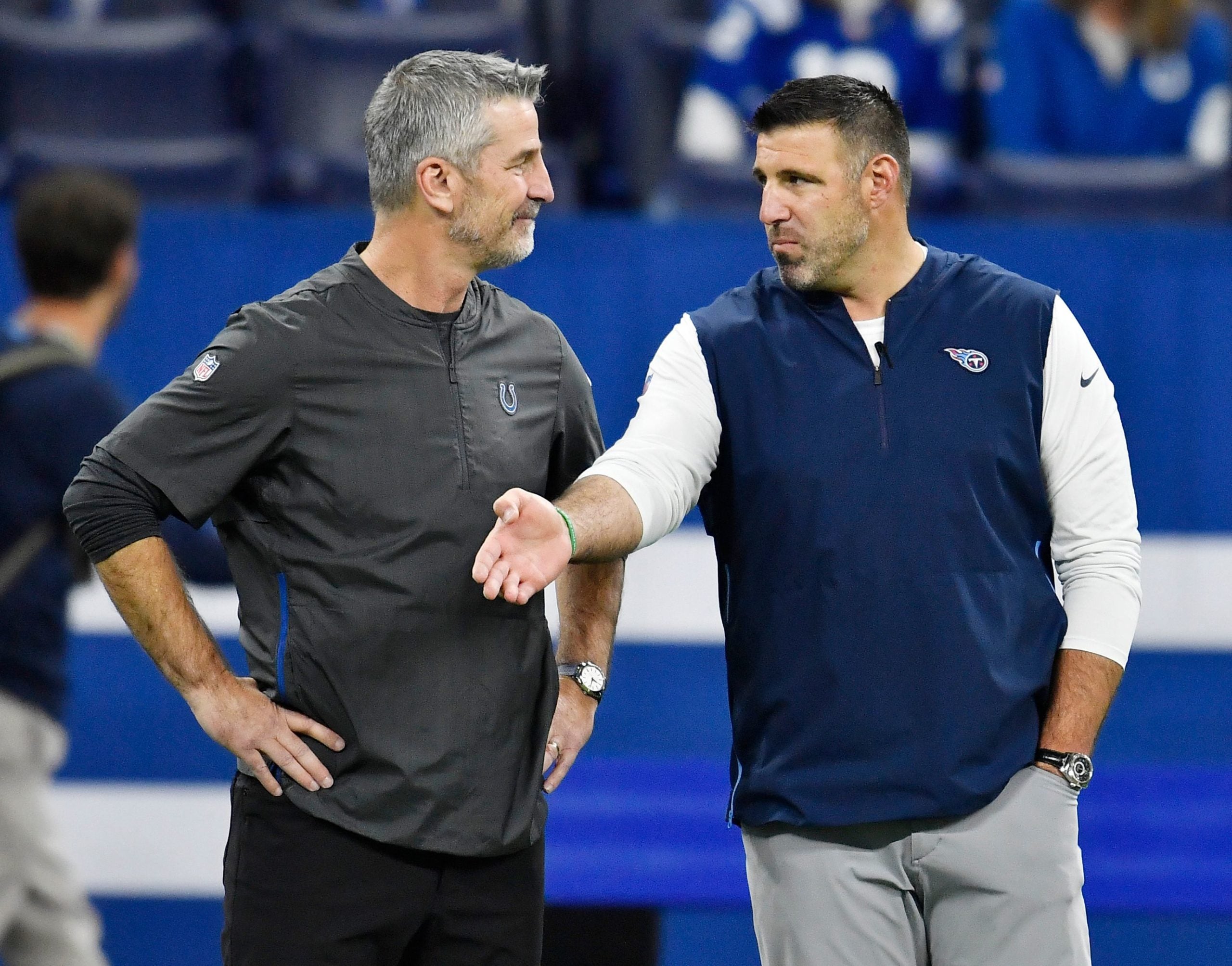 Titans head coach Mike Vrabel chats with Colts head coach Frank Reich before the game at Lucas Oil Stadium Sunday, Nov. 18, 2018, in Indianapolis, Ind. Gw59908