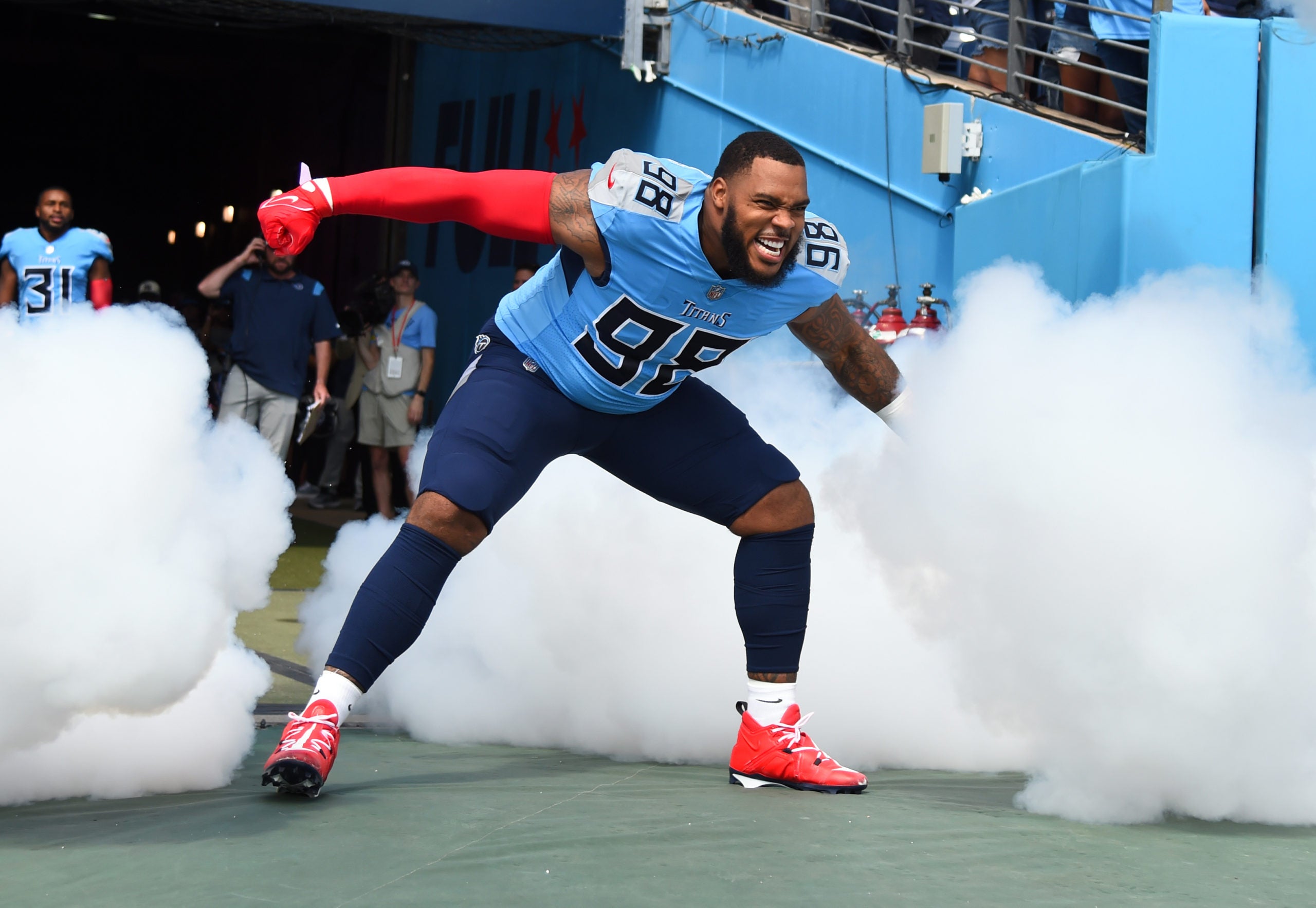 Sep 25, 2022; Nashville, Tennessee, USA; Tennessee Titans defensive tackle Jeffery Simmons (98) takes the field before the game against the Las Vegas Raiders at Nissan Stadium. Mandatory Credit: Christopher Hanewinckel-USA TODAY Sports