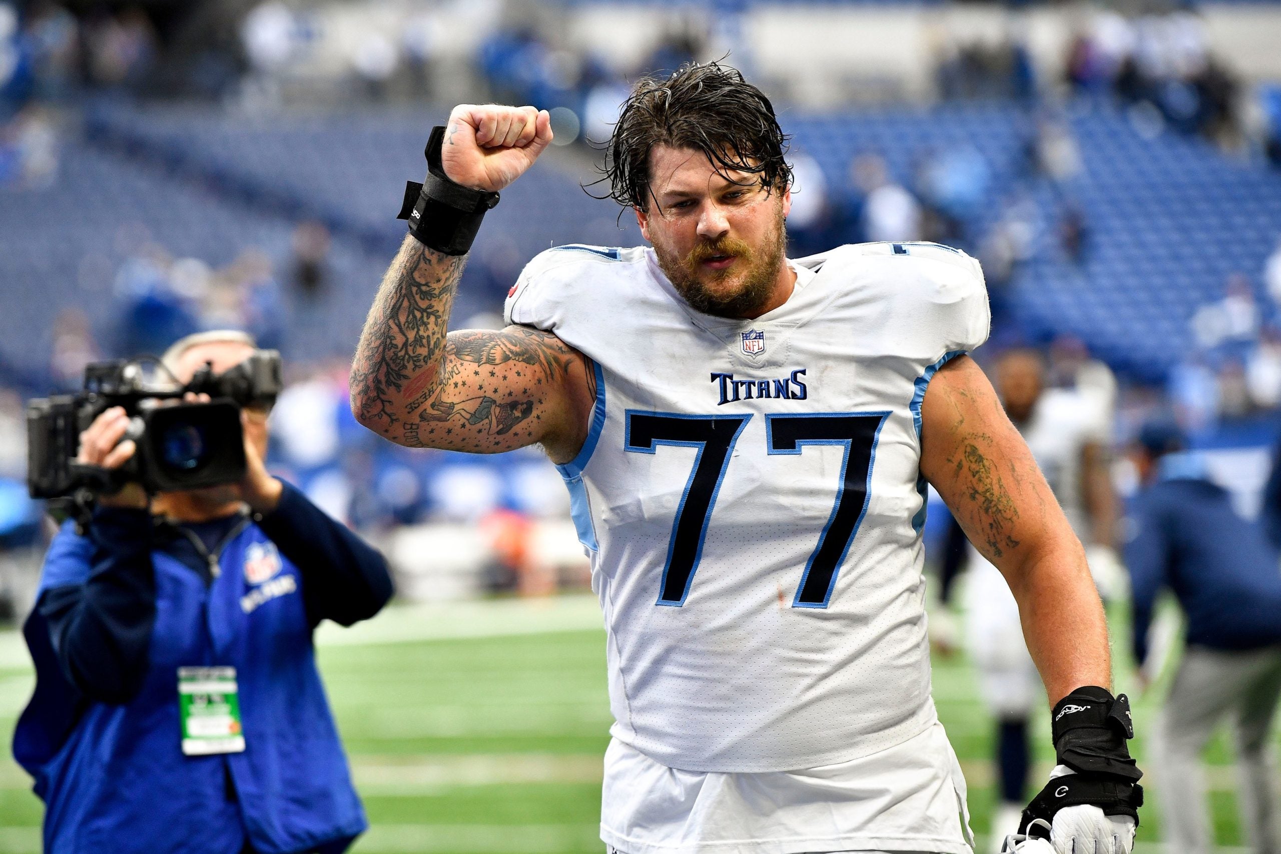 Tennessee Titans offensive tackle Taylor Lewan (77) celebrates their overtime win at Lucas Oil Stadium Sunday, Oct. 31, 2021 in Indianapolis, Ind. Titans Colts 167