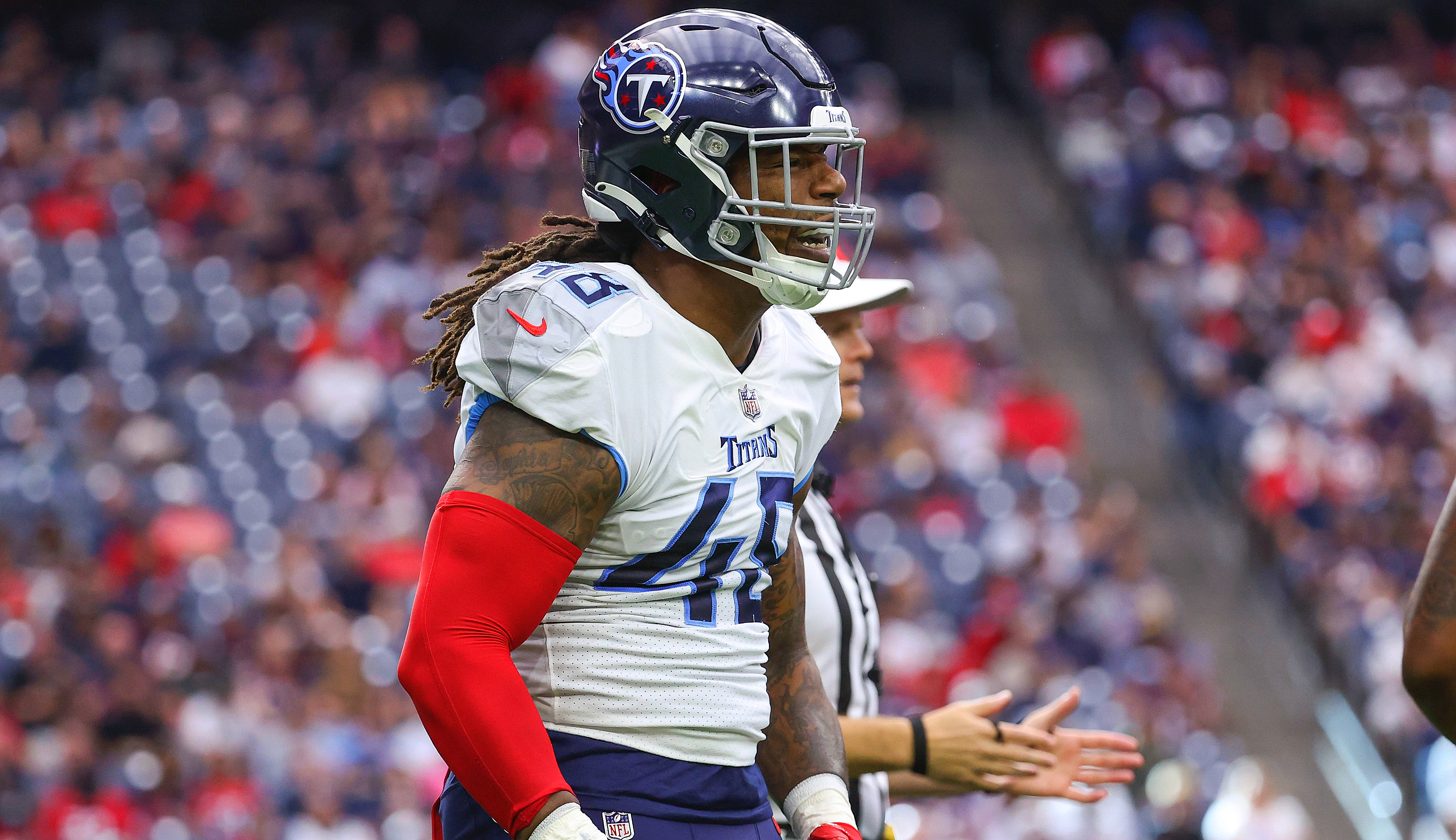 Oct 30, 2022; Houston, Texas, USA; Tennessee Titans linebacker Bud Dupree (48) reacts after a play during the game against the Houston Texans at NRG Stadium. Mandatory Credit: Troy Taormina-USA TODAY Sports