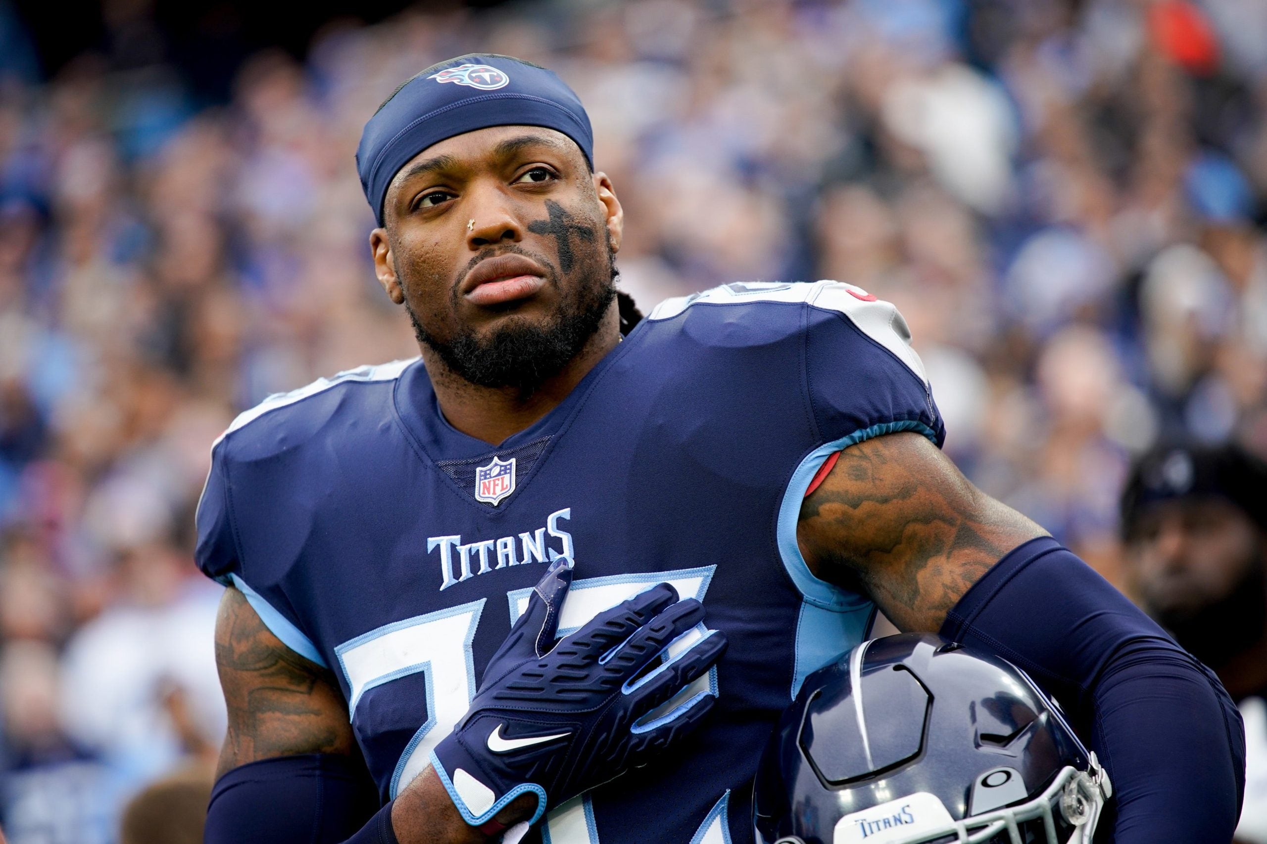 Tennessee Titans running back Derrick Henry (22) listens to the National Anthem before facing the Jacksonville Jaguars at Nissan Stadium Sunday, Dec. 11, 2022, in Nashville, Tenn. Nfl Jacksonville Jaguars At Tennessee Titans