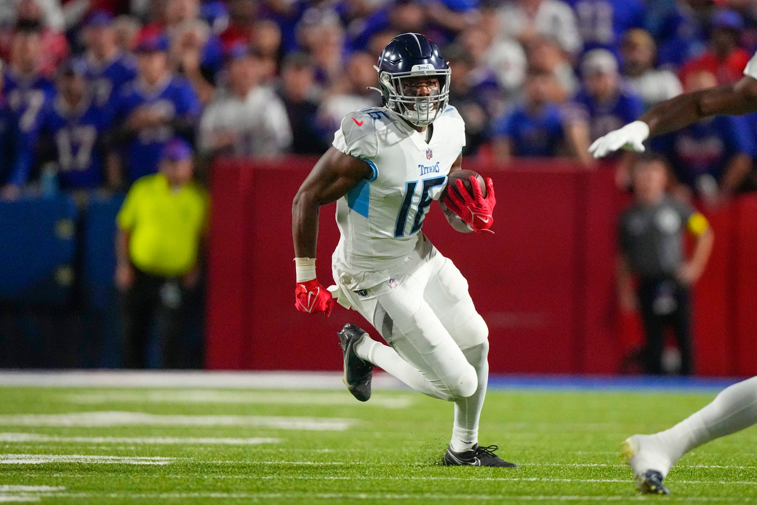 Sep 19, 2022; Orchard Park, New York, USA; Tennessee Titans wide receiver Treylon Burks (16) runs with the ball after making a catch against the Buffalo Bills during the first half at Highmark Stadium. Mandatory Credit: Gregory Fisher-USA TODAY Sports