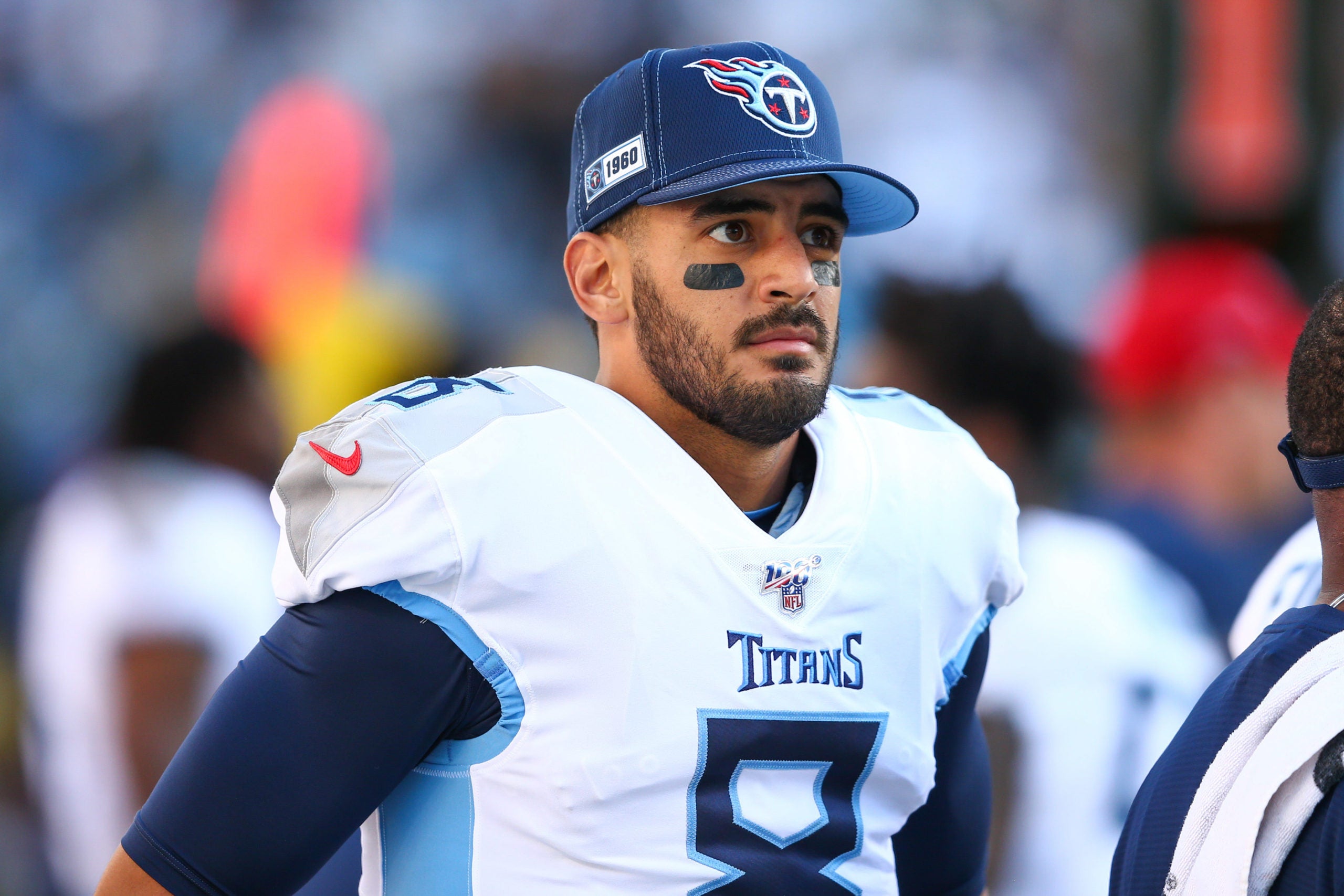 Nov 3, 2019; Charlotte, NC, USA; Tennessee Titans quarterback Marcus Mariota (8) stands on the sidelines during the game against the Carolina Panthers at Bank of America Stadium. Mandatory Credit: Jeremy Brevard-USA TODAY Sports