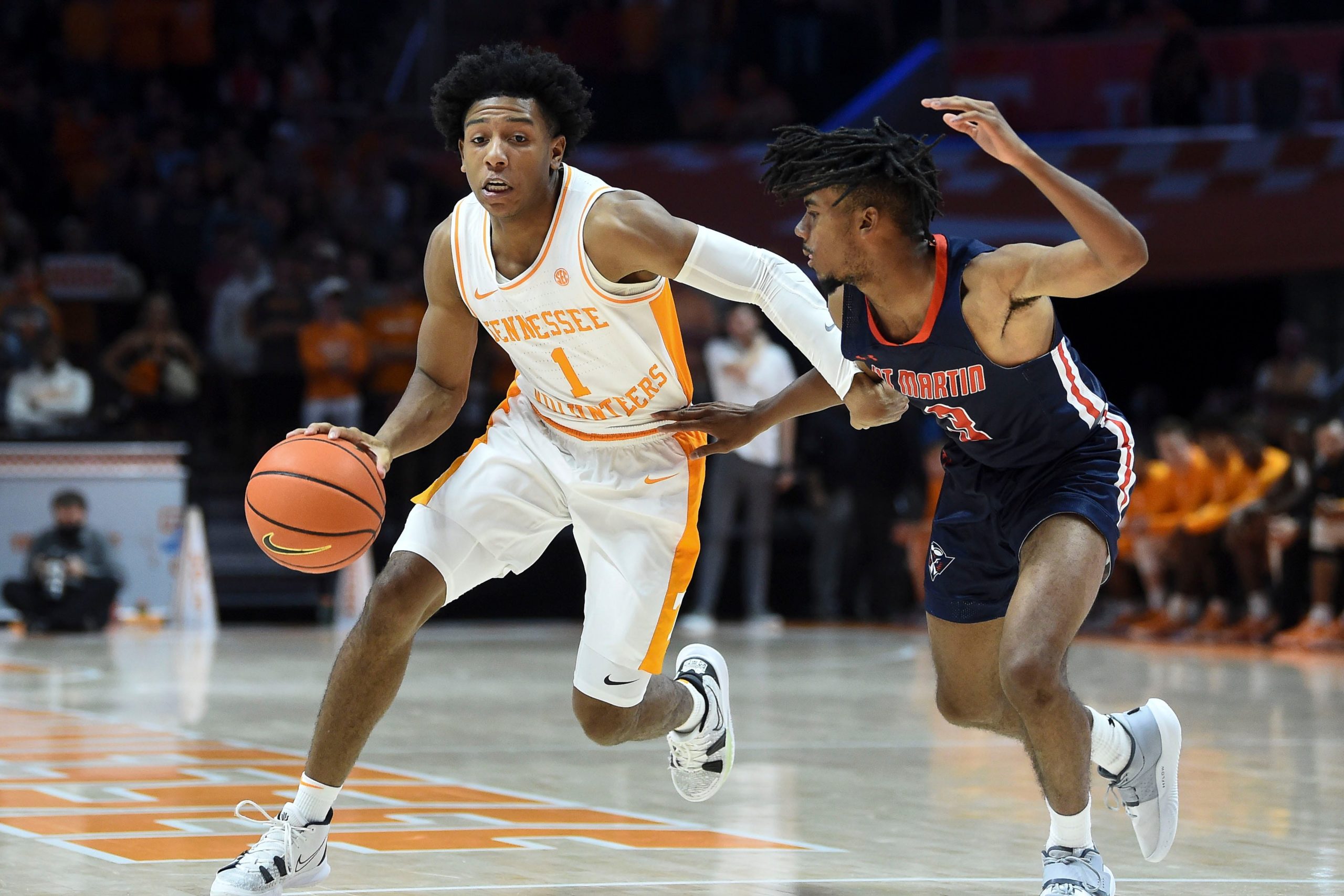 Tennessee guard Kennedy Chandler (1) is guarded by UT Martin guard Mikel Henderson (3) during an NCAA basketball game between the Tennessee Volunteers and UT Martin Skyhawks in Knoxville, Tenn. on Tuesday, November 9, 2021. Kns Vols Utmartin