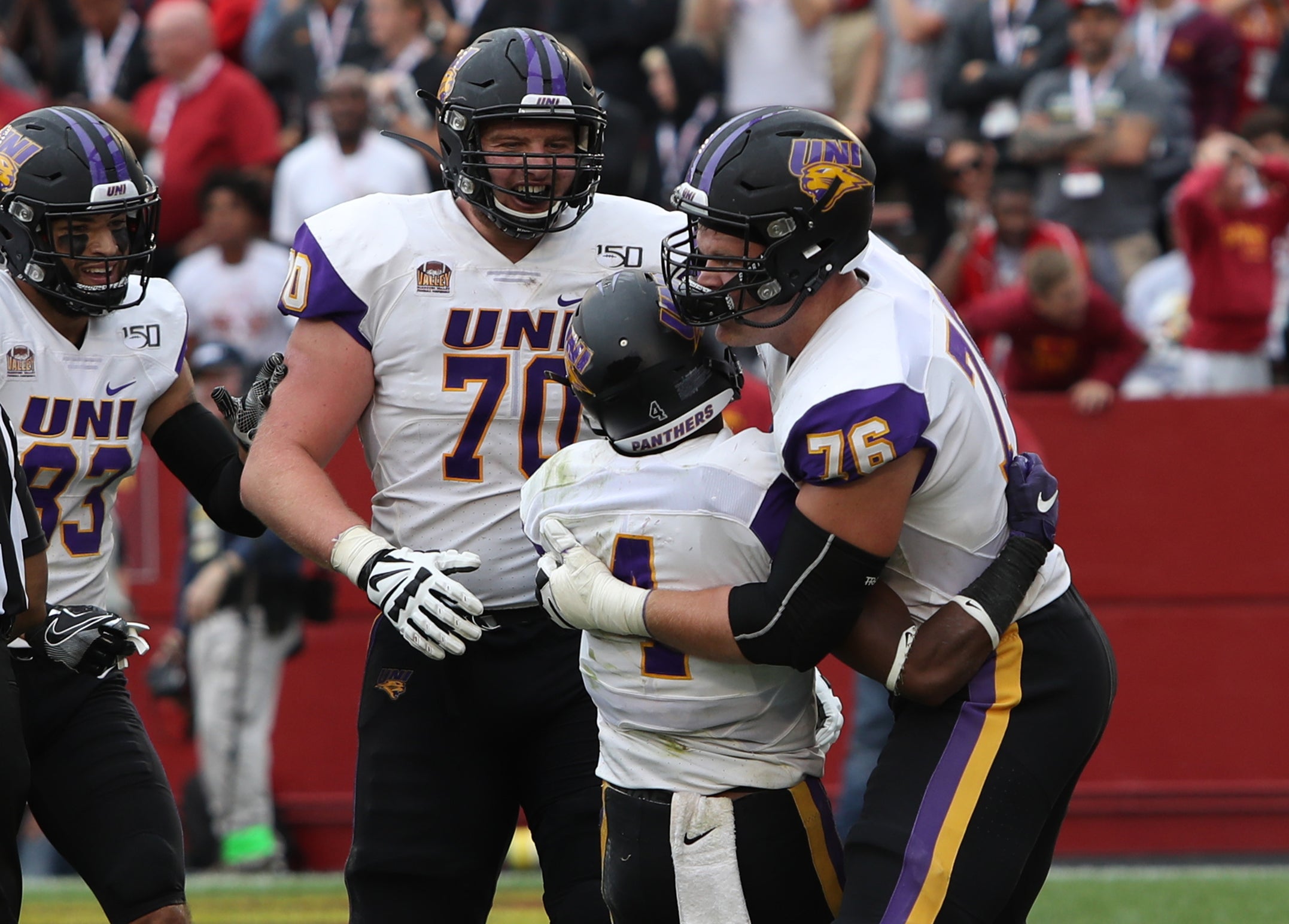 Aug 31, 2019; Ames, IA, USA; Northern Iowa Panthers wide receiver Deion McShane (4) celebrates with offensive lineman Spencer Brown (76) and offensive lineman Trevor Penning (70) after scoring a touchdown against the Iowa State Cyclones at Jack Trice Stadium. The Cyclones won 29-26 in three overtimes. Mandatory Credit: Reese Strickland-USA TODAY Sports
