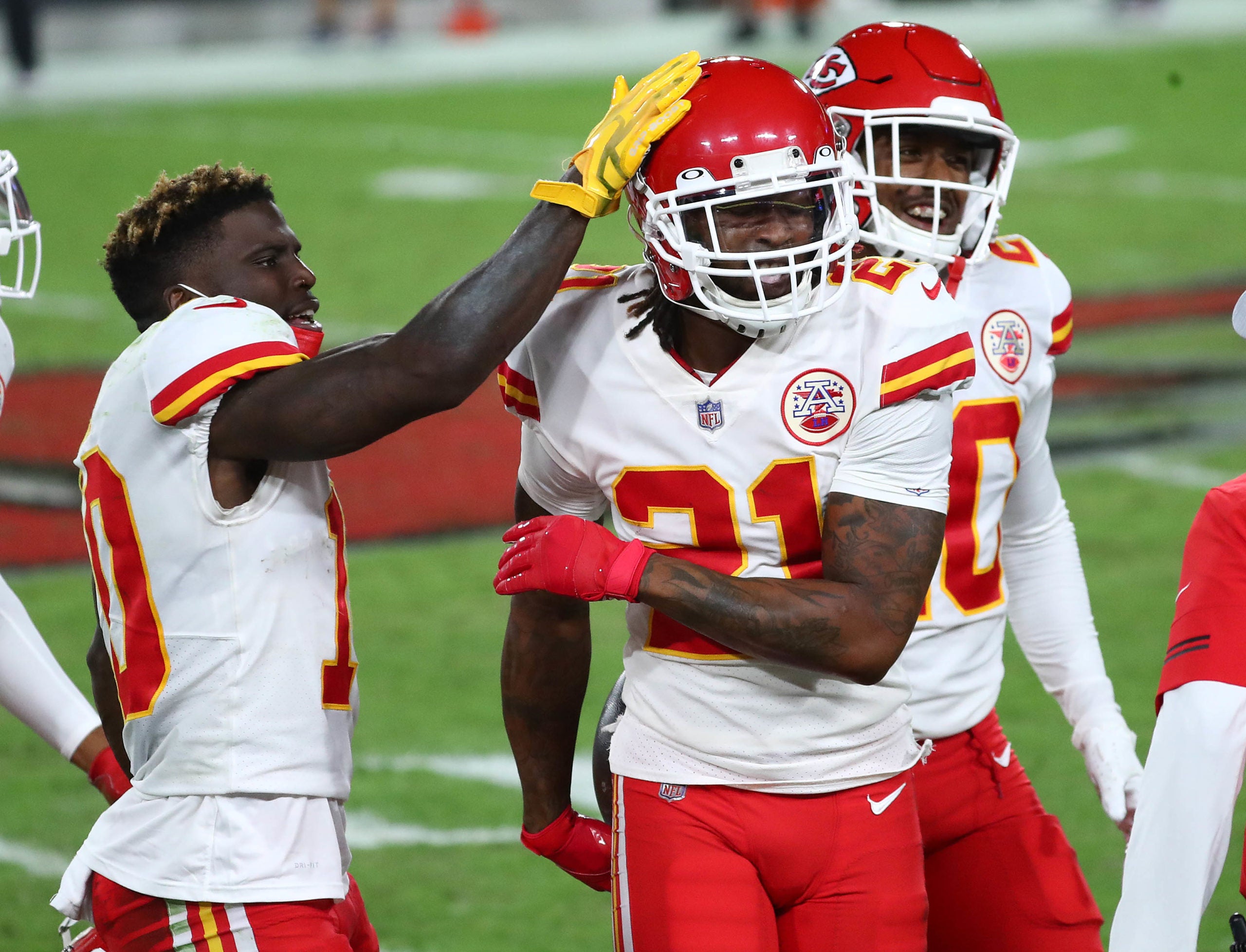 Nov 29, 2020; Tampa, Florida, USA; Kansas City Chiefs cornerback Bashaud Breeland (21) celebrates with wide receiver Tyreek Hill (10) after an interception against the Tampa Bay Buccaneers during the second half at Raymond James Stadium. Mandatory Credit: Kim Klement-USA TODAY Sports