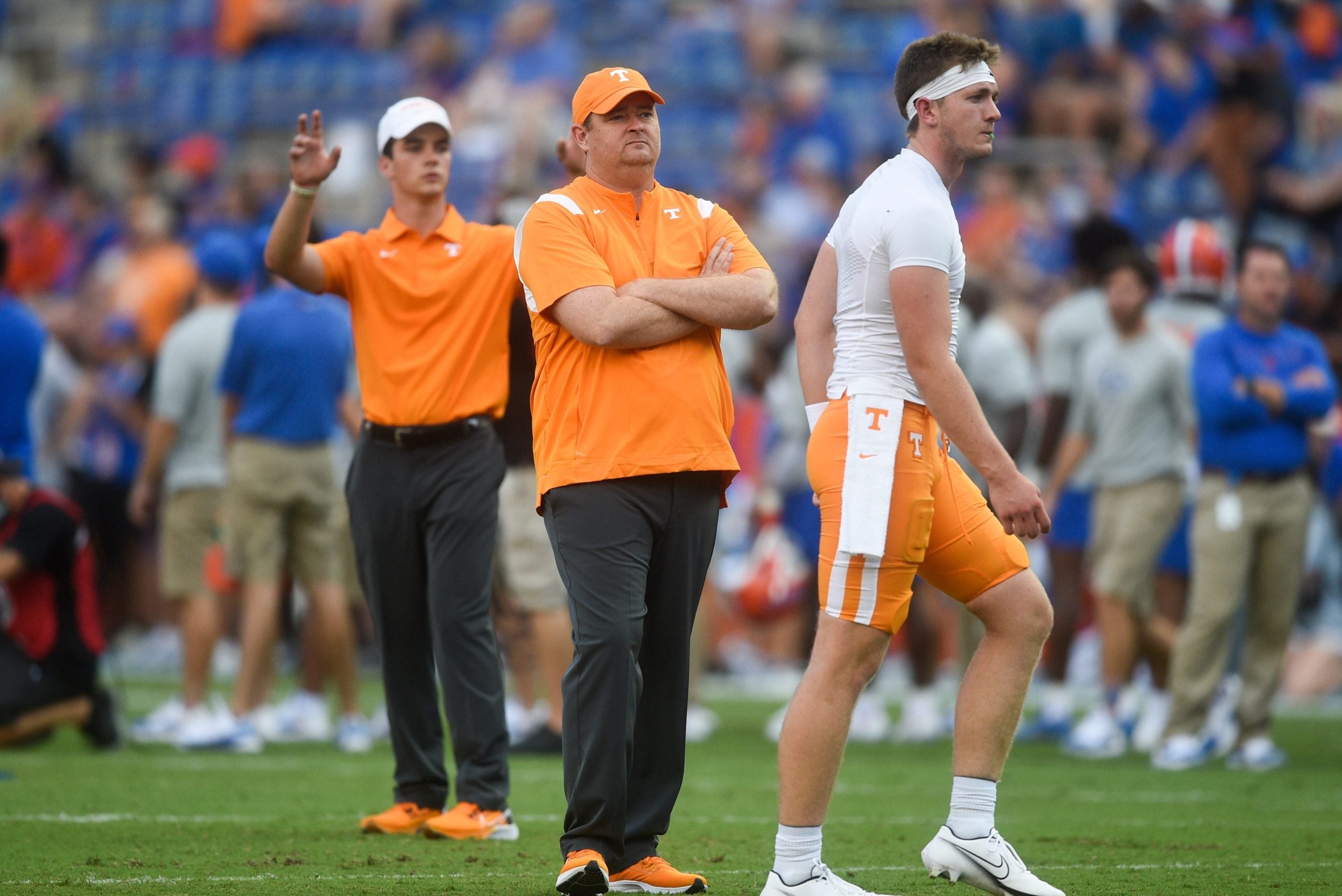 Tennessee Head Coach Josh Heupel  watches as Tennessee quarterback Harrison Bailey (15) warms up before an NCAA football game against Florida at Ben Hill Griffin Stadium in Gainesville, Florida on Saturday, Sept. 25, 2021. Tennflorida0925 0174