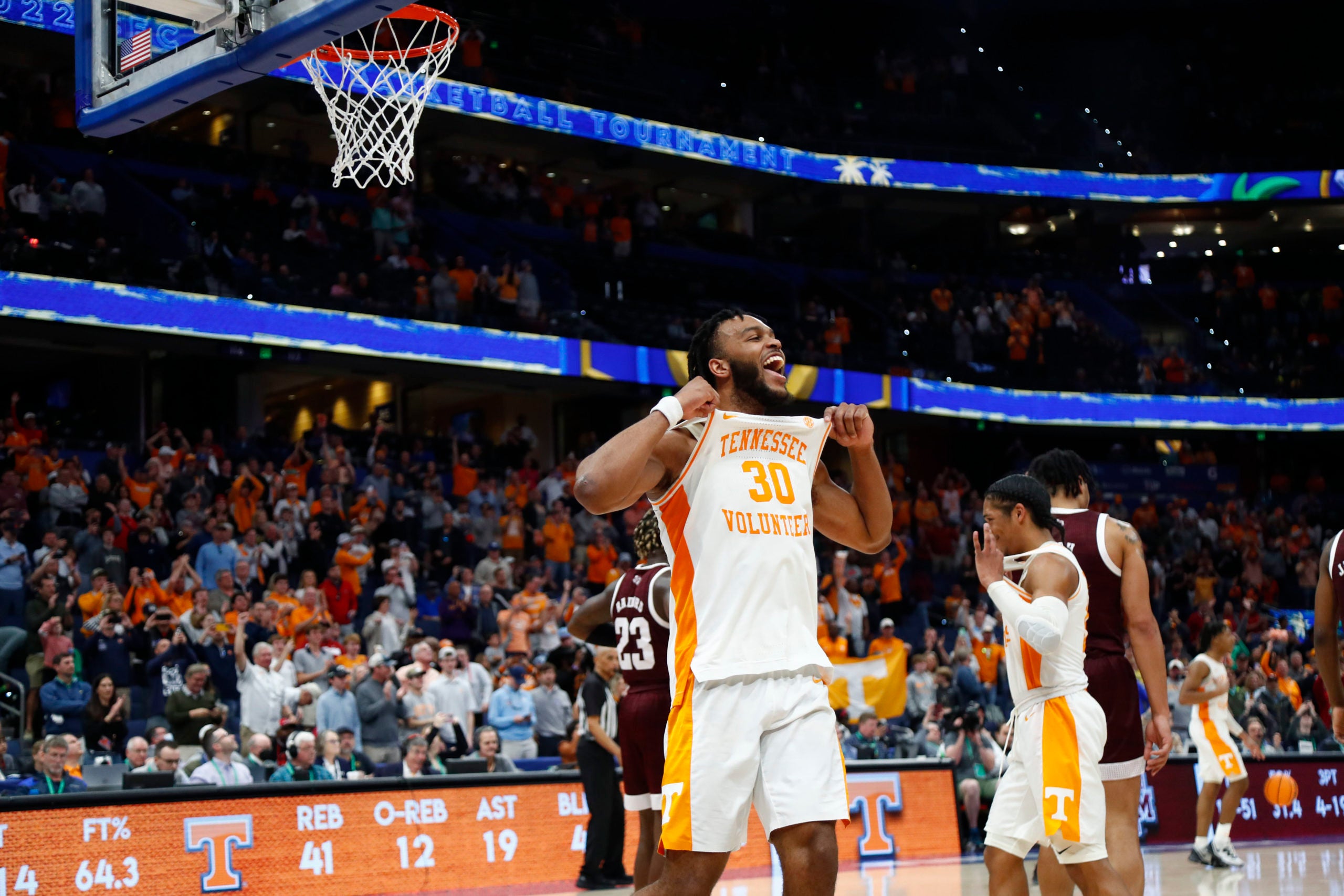 Mar 13, 2022; Tampa, FL, USA; Tennessee Volunteers guard Josiah-Jordan James (30) celebrates after defeating the Texas A&M Aggies at Amalie Arena. Mandatory Credit: Kim Klement-USA TODAY Sports