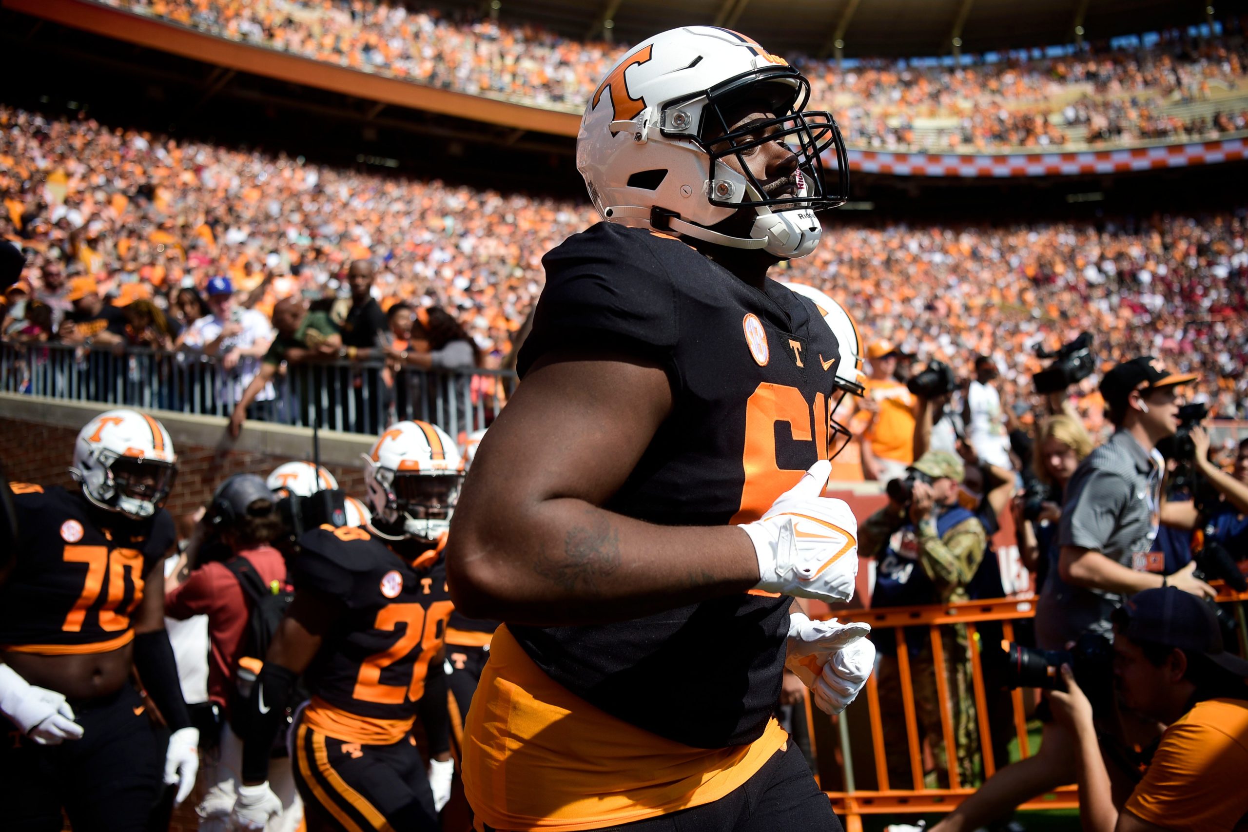 Tennessee offensive lineman William Parker (64) runs on the field before an NCAA college football game between the Tennessee Volunteers and the South Carolina Gamecocks in Knoxville, Tenn. on Saturday, Oct. 9, 2021. Kns Tennessee South Carolina Football