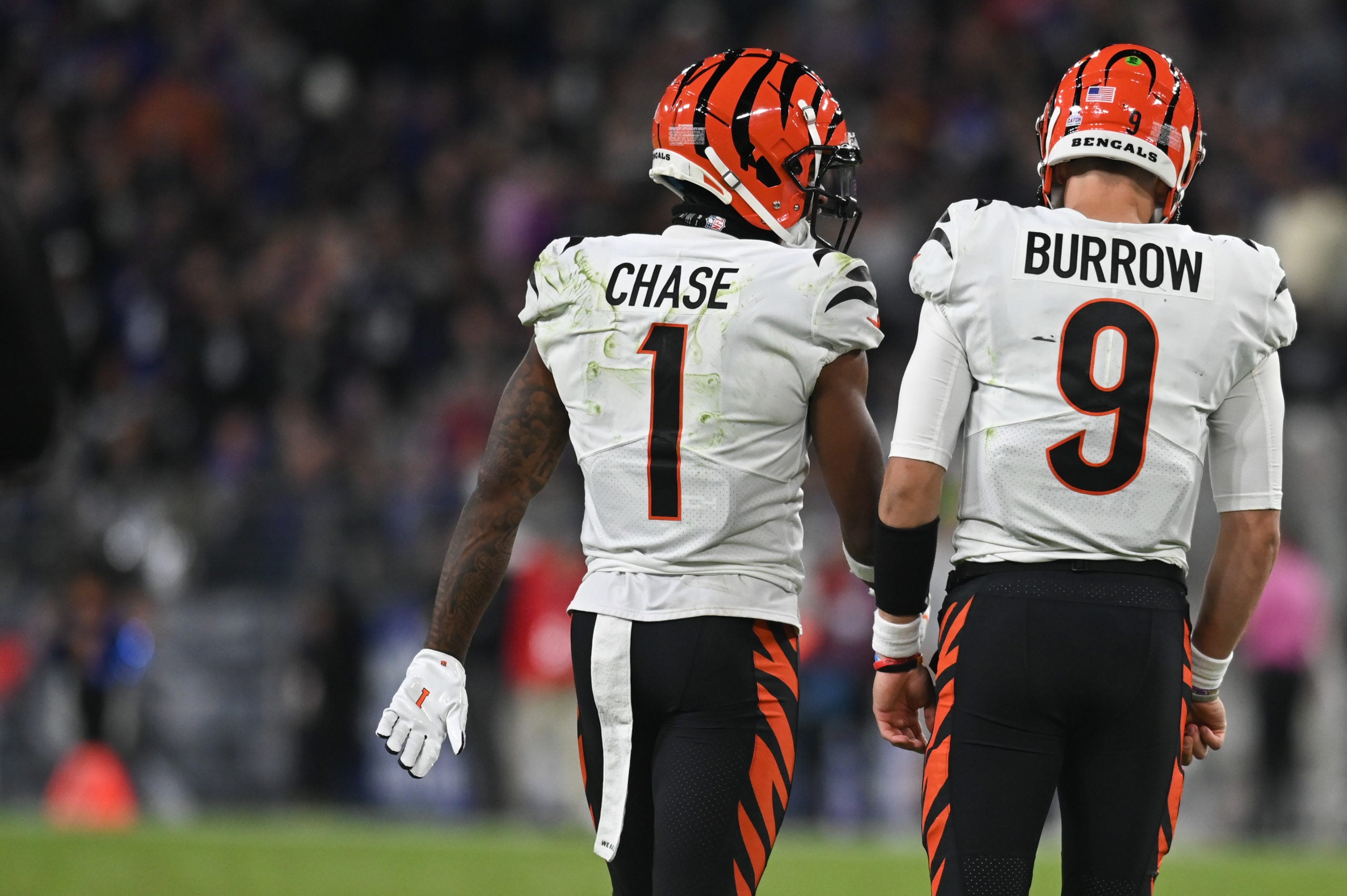 Oct 9, 2022; Baltimore, Maryland, USA;  Cincinnati Bengals wide receiver Ja'Marr Chase (1) speaks with quarterback Joe Burrow (9) during the game against the Baltimore Ravens at M&T Bank Stadium. Mandatory Credit: Tommy Gilligan-USA TODAY Sports