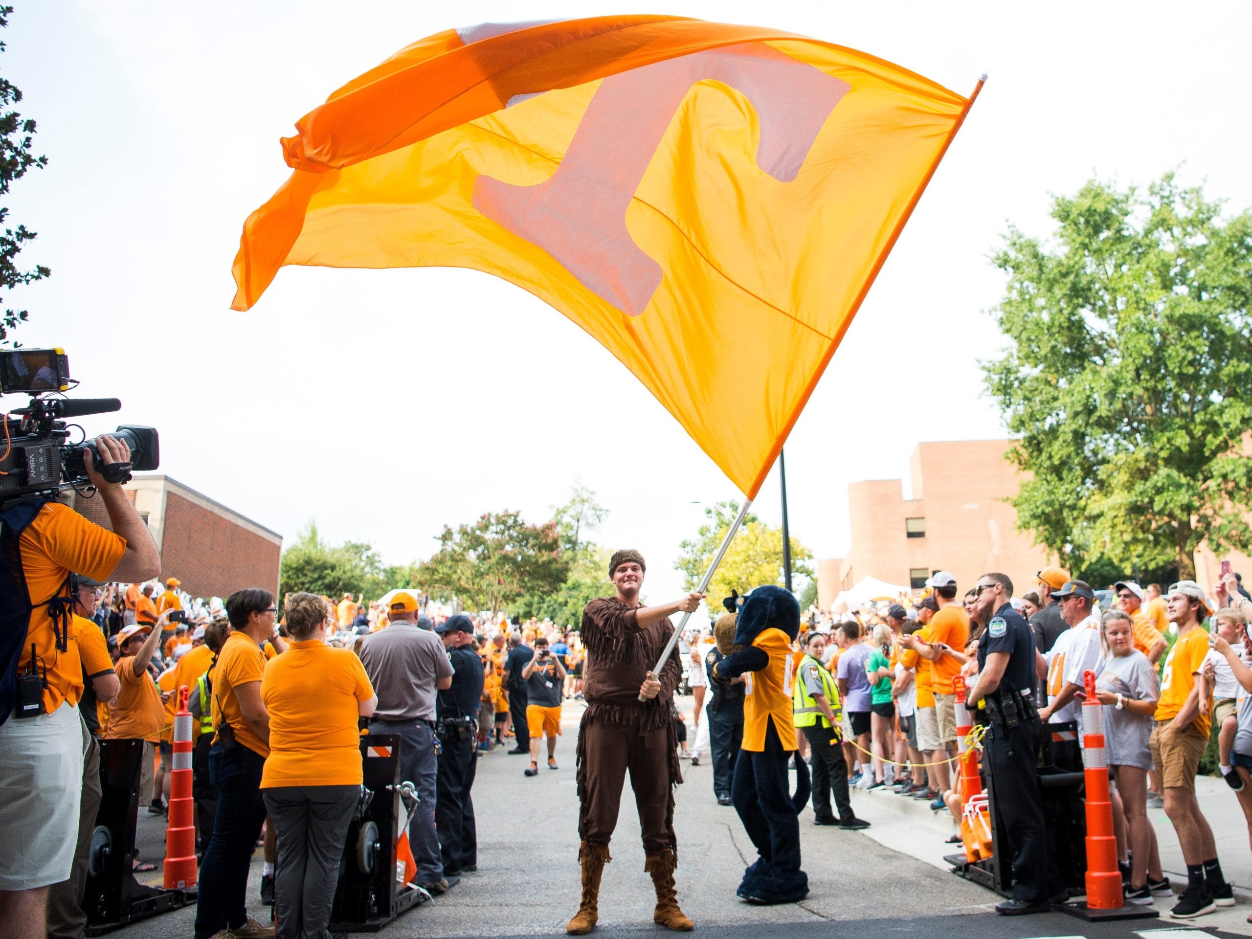 A Power T flag is waved during the Vol Walk before Tennessee's home game against Chattanooga in Neyland Stadium in Knoxville on Saturday, Sept. 14, 2019. Kns Volwalk Bp Jpg