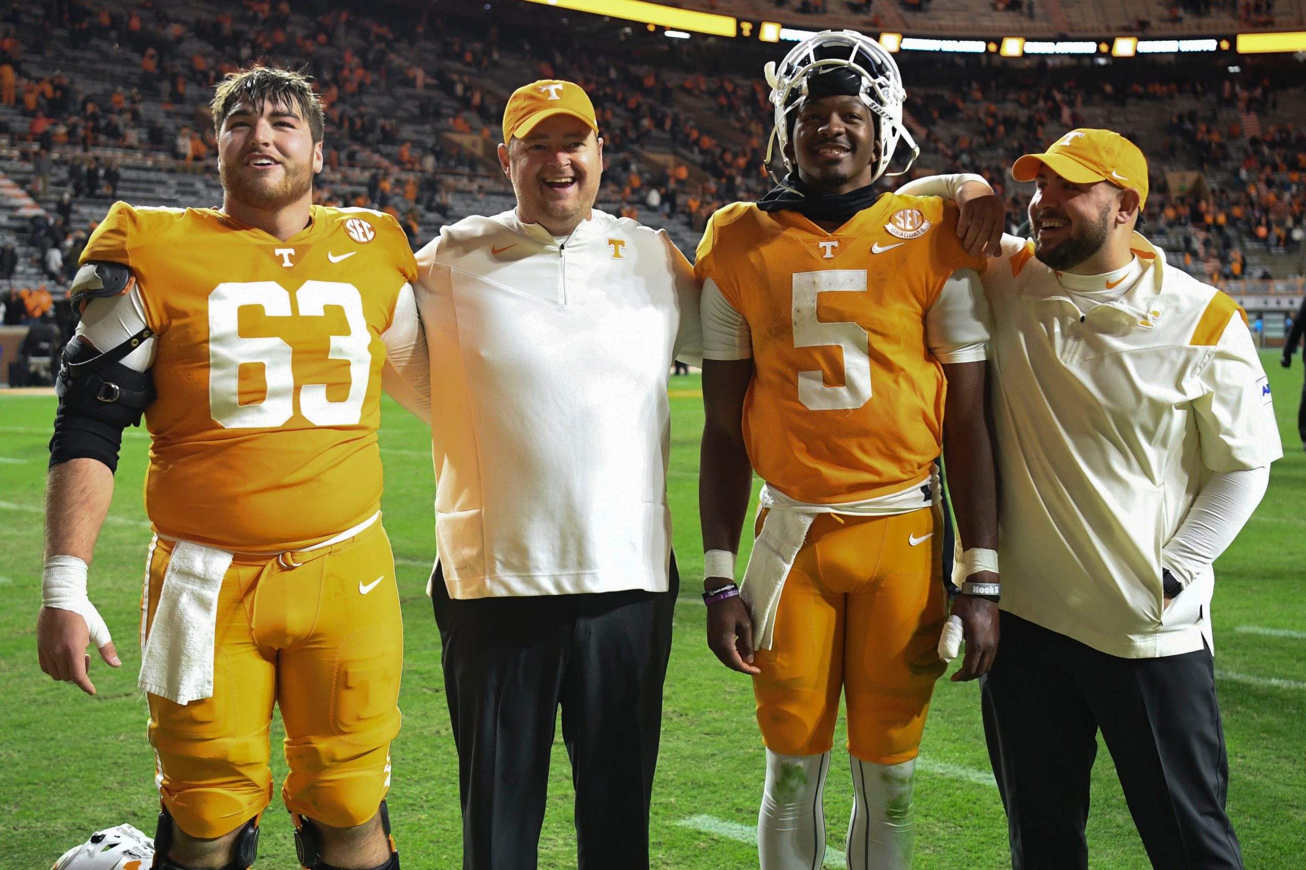 From left, Tennessee offensive lineman Cooper Mays (63), Head Coach Josh Heupel, quarterback Hendon Hooker (5), and Offensive Analyst Mitch Militello stand before the Pride of the Southland Band as they perform “Tennessee Waltz” after a win in the NCAA college football game between the Tennesse Volunteers and Vanderbilt Commodores in Knoxville, Tenn. on Saturday, November 27, 2021. Kns Tennessee Vanderbilt Football