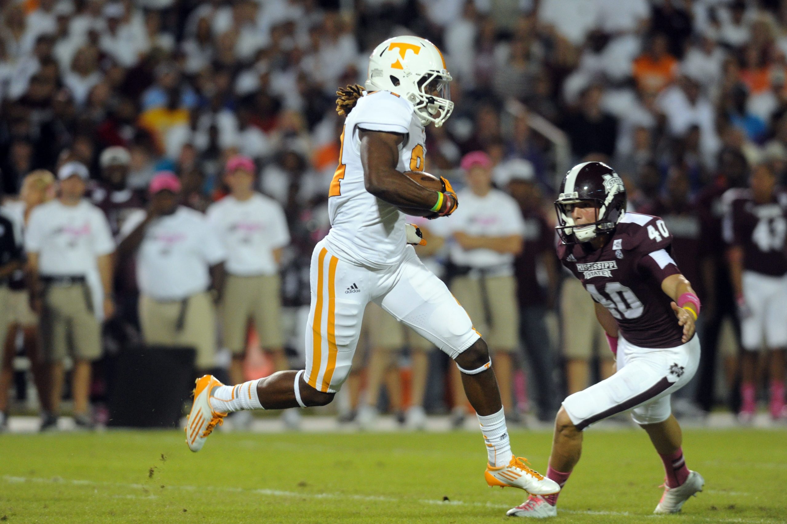 Tennessee wide receiver Cordarrelle Patterson (84) runs the ball back for a touchdown on a kickoff from Mississippi State closing the Bulldog's gap to 17-13 in the second quarter at Davis Wade Stadium in Starkville, Miss., Saturday, Oct. 13, 2012. (ADAM BRIMER/NEWS SENTINEL) 1014 Kcsp Vols15 Atb