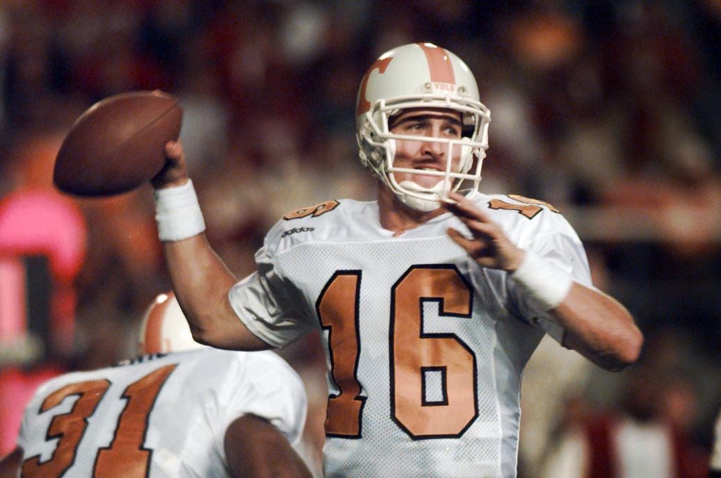 Tennessee quarterback Peyton Manning looks for a receiver during the Vols' 38-21 victory over Alabama Saturday, Oct. 19, 1997, in Birmingham. Manning had his sixth straight 300-yard game and became first SEC quarterback to beat Alabama three times. Ut Peyton Manning Qb 1997