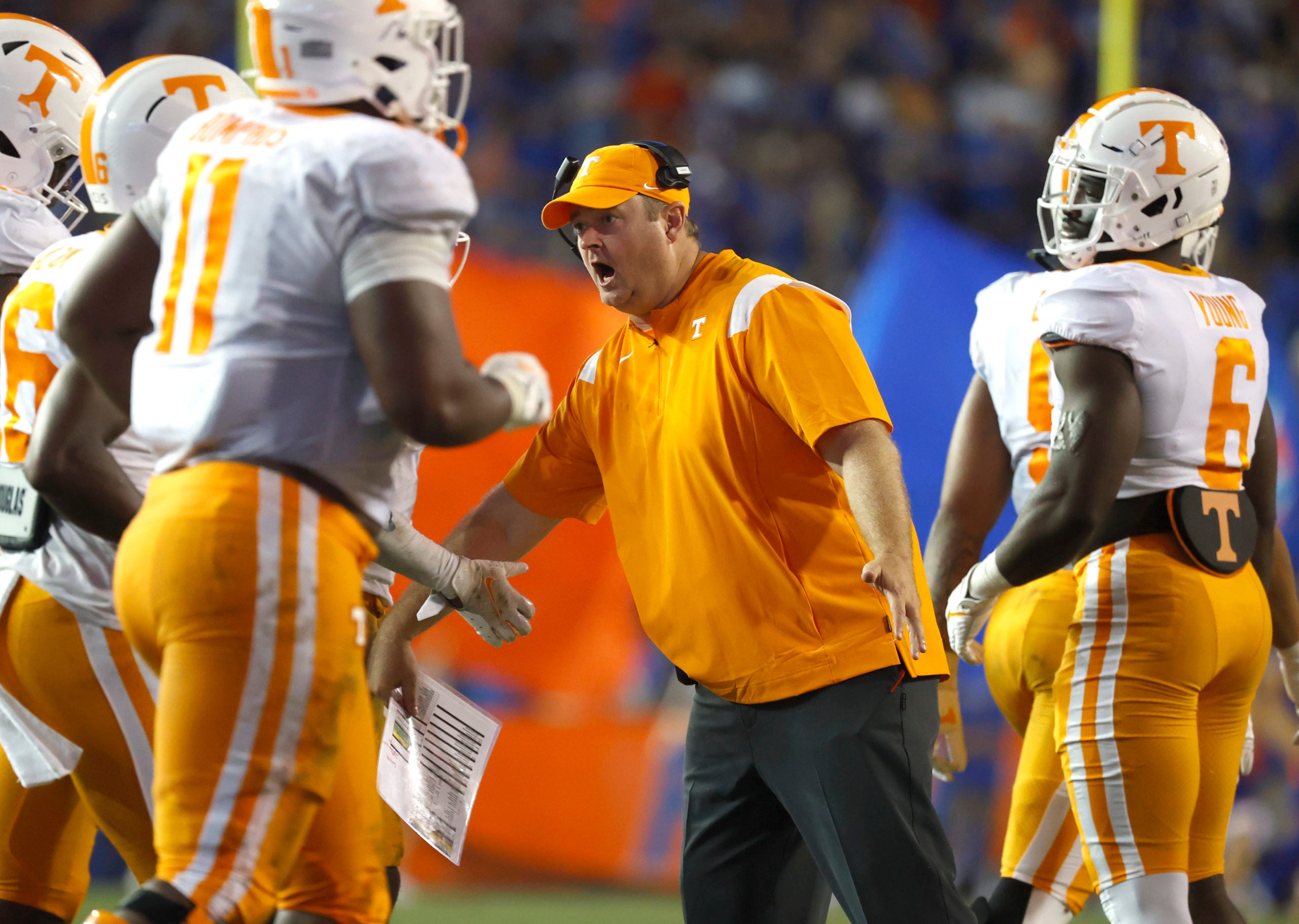 Sep 25, 2021; Gainesville, Florida, USA; Tennessee Volunteers head coach Josh Heupel reacts with teammates against the Florida Gators during the third quarter at Ben Hill Griffin Stadium. Mandatory Credit: Kim Klement-USA TODAY Sports