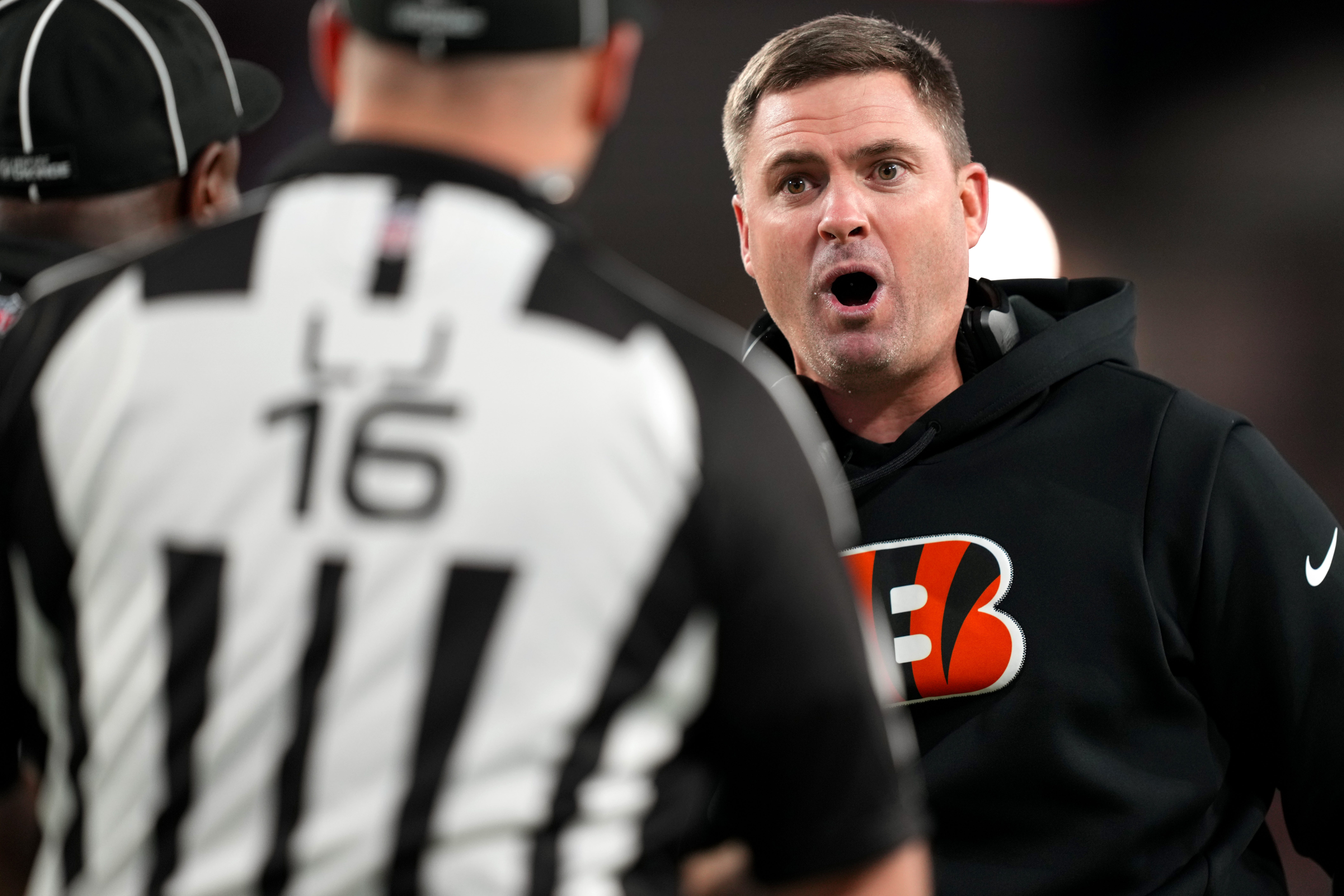 Cincinnati Bengals head coach Zac Taylor argues with down judge Kevin Codey (16) in the third quarter during a Week 15 NFL game against the Tampa Bay Buccaneers, Sunday, Dec. 18, 2022, at Raymond James Stadium in Tampa, Fla. The Cincinnati Bengals won, 34-23. The Cincinnati Bengals improved to 10-4 on the season. Nfl Cincinnati Bengals At Tampa Bay Buccaneers Dec 18 0048