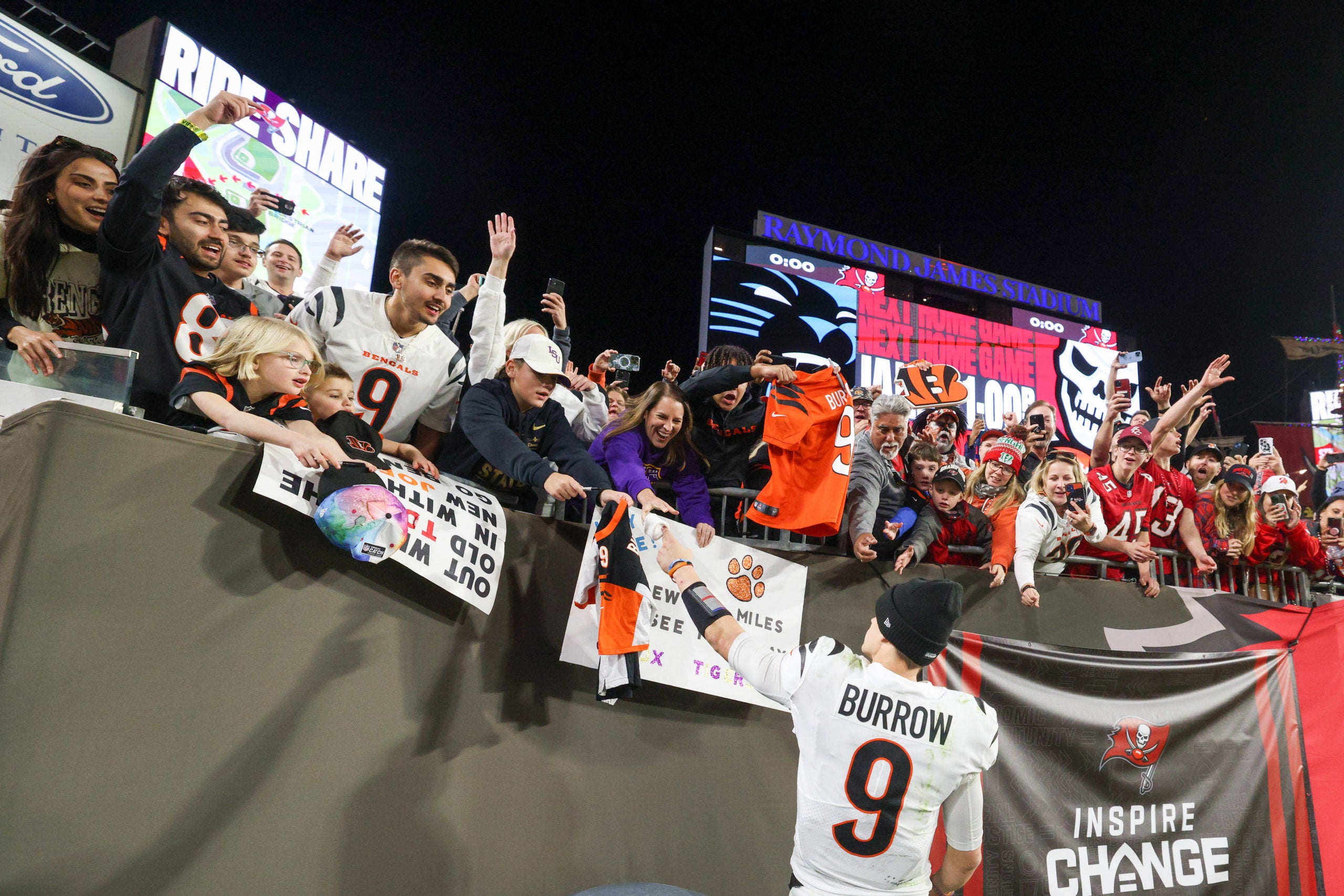 Dec 18, 2022; Tampa, Florida, USA;  Cincinnati Bengals quarterback Joe Burrow (9) greet the fans after beating the Tampa Bay Buccaneers at Raymond James Stadium. Mandatory Credit: Nathan Ray Seebeck-USA TODAY Sports